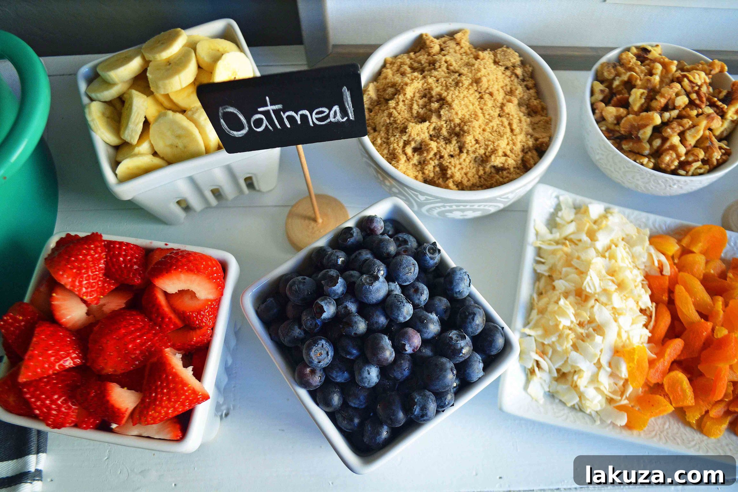 Craft Your Oat Creation 5 A vibrant oatmeal toppings bar featuring various bowls of fresh fruits, nuts, dried fruits, and sweeteners for customization.