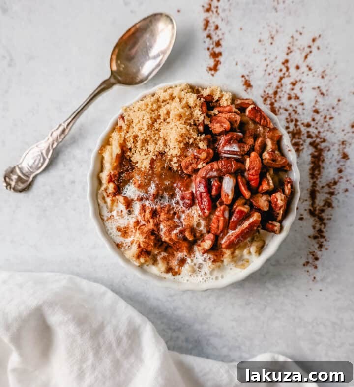 Craft Your Oat Creation 9 Pumpkin spice pecan oatmeal with brown sugar, a warm and inviting bowl for autumn mornings.