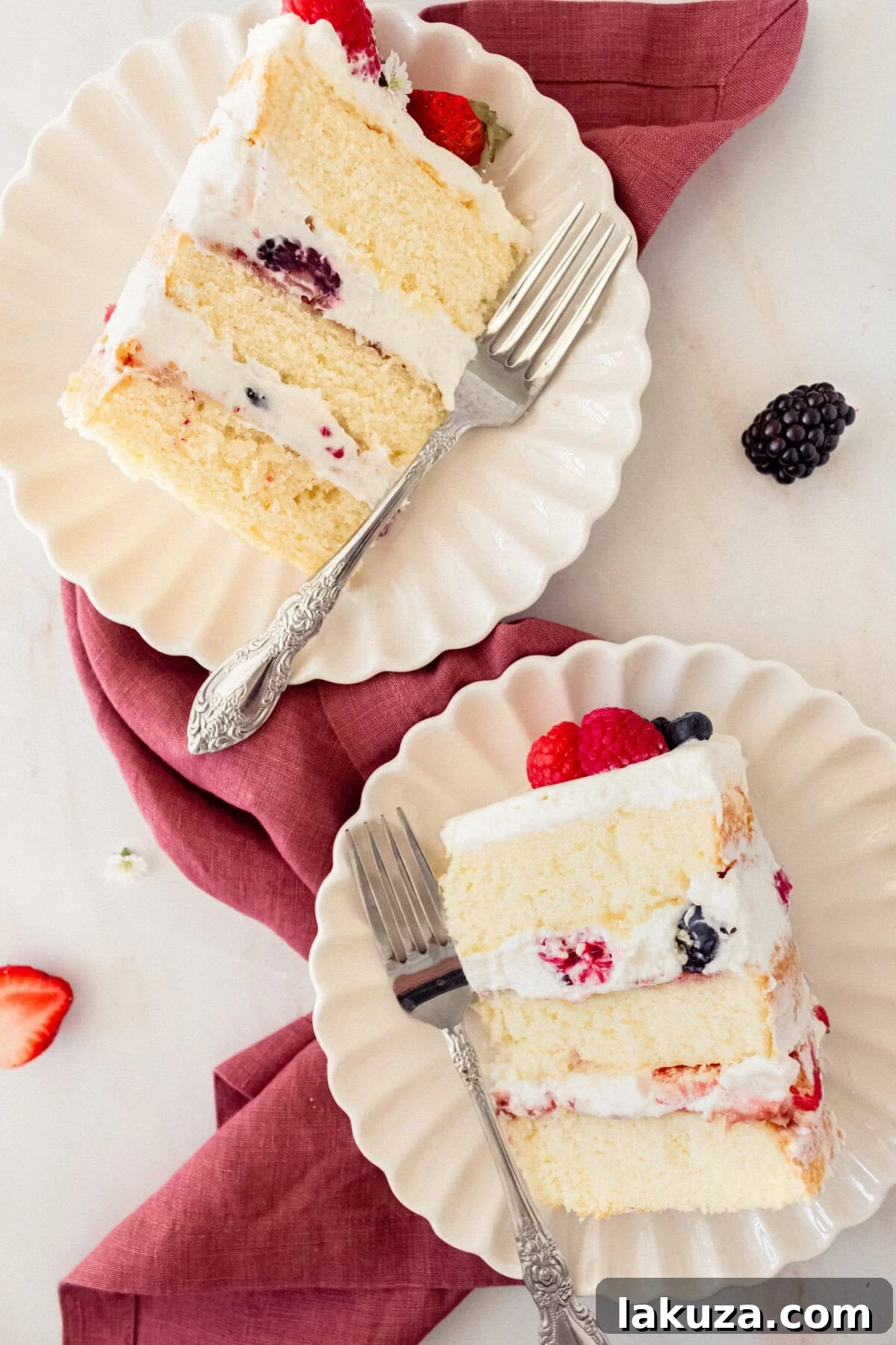 Berry Chantilly Cake 14 A vibrant Berry Chantilly Cake with fresh berries perfectly arranged on top, showcasing the beauty of this dessert.