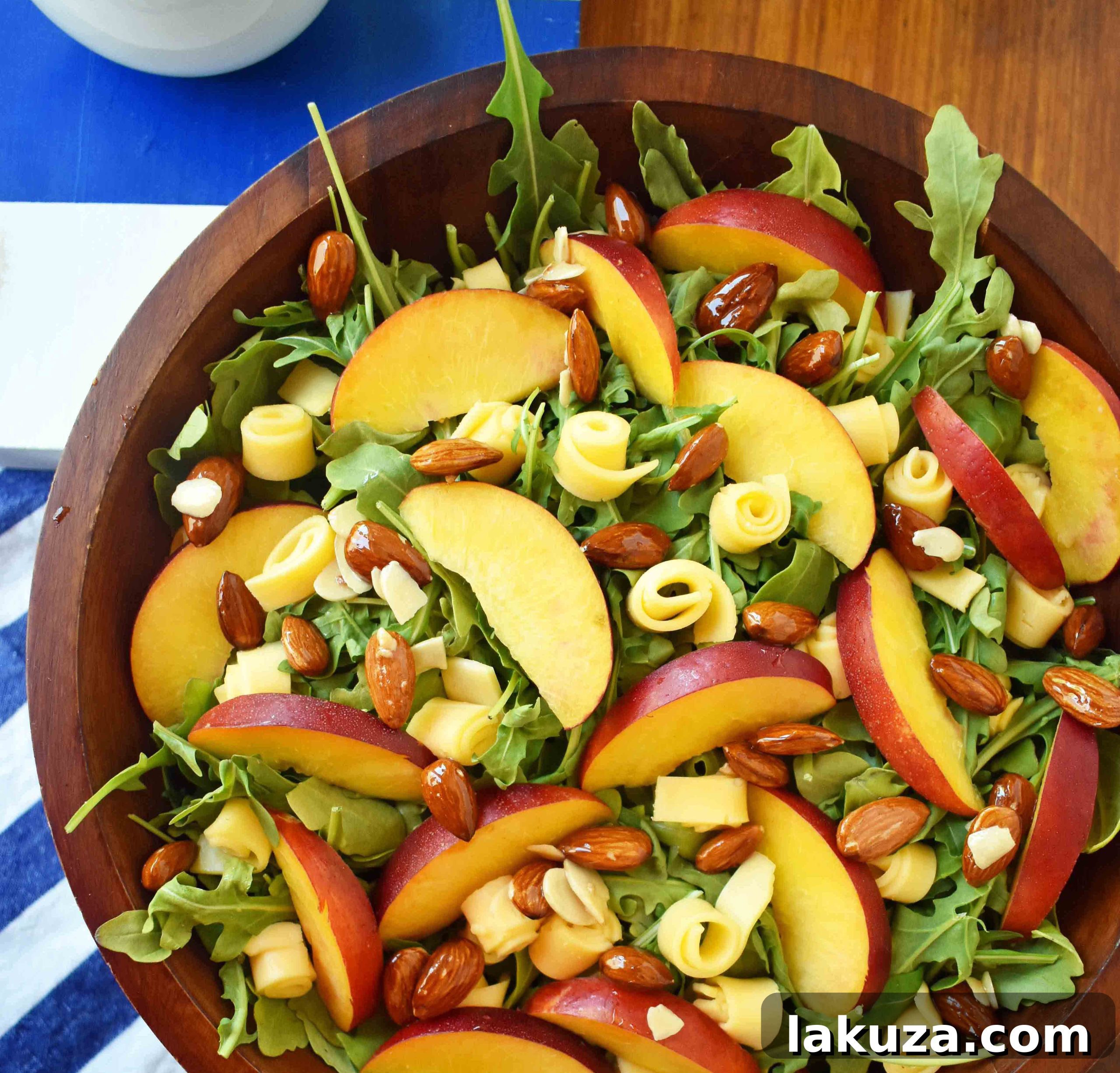 Honeyed Peach, Gouda & Toasted Almond Medley 3 Peach Gouda Honey Almond Salad. Arugula, Creamy Gouda Cheese, Sweet Peaches or Nectarines, and Honey Glazed Almonds tossed with a Sweet Honey Dressing. Modern Honey.