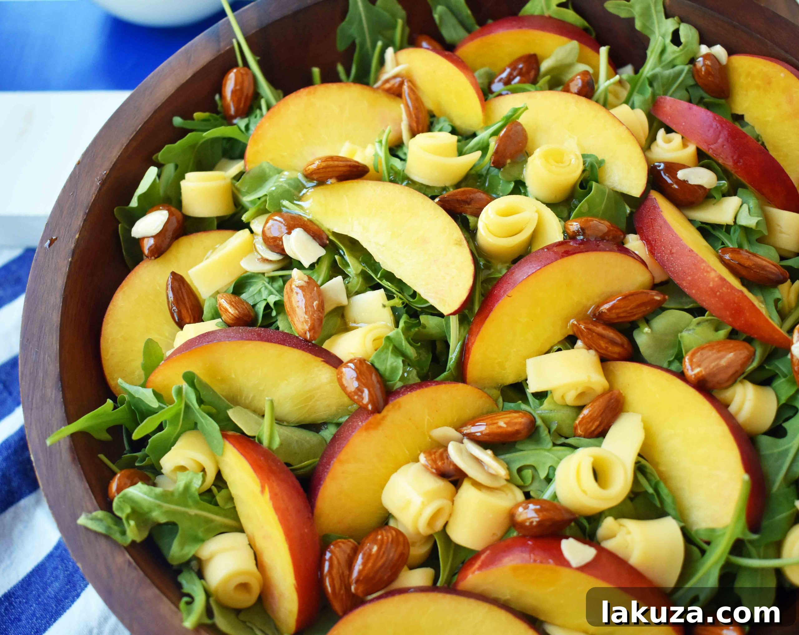 Honeyed Peach, Gouda & Toasted Almond Medley 4 Peach Gouda Honey Almond Salad. Arugula, Creamy Gouda Cheese, Sweet Peaches or Nectarines, and Honey Glazed Almonds tossed with a Sweet Honey Dressing. Modern Honey.