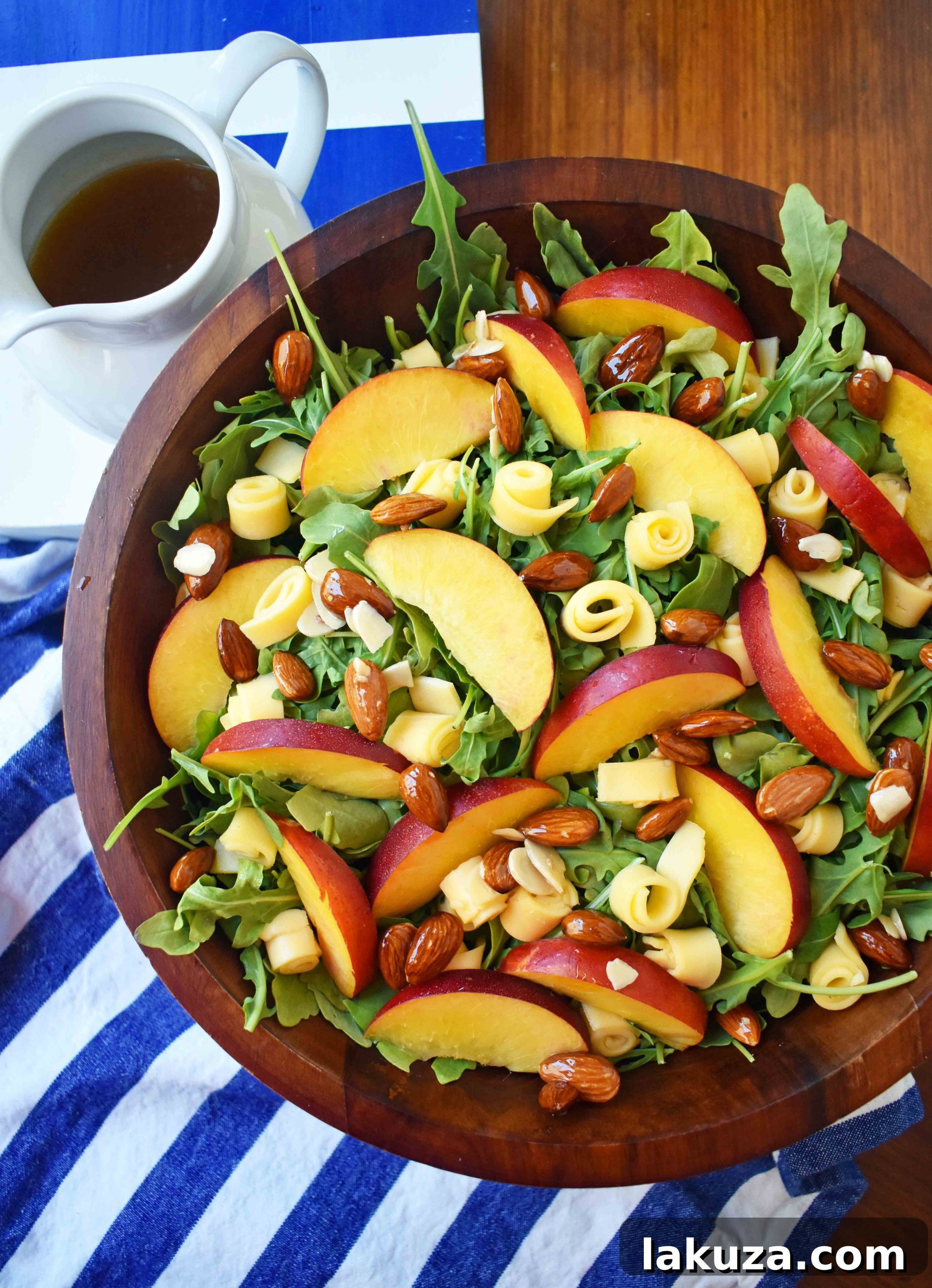 Honeyed Peach, Gouda & Toasted Almond Medley 5 Peach Gouda Honey Almond Salad. Arugula, Creamy Gouda Cheese, Sweet Peaches or Nectarines, and Honey Glazed Almonds tossed with a Sweet Honey Dressing. Modern Honey.