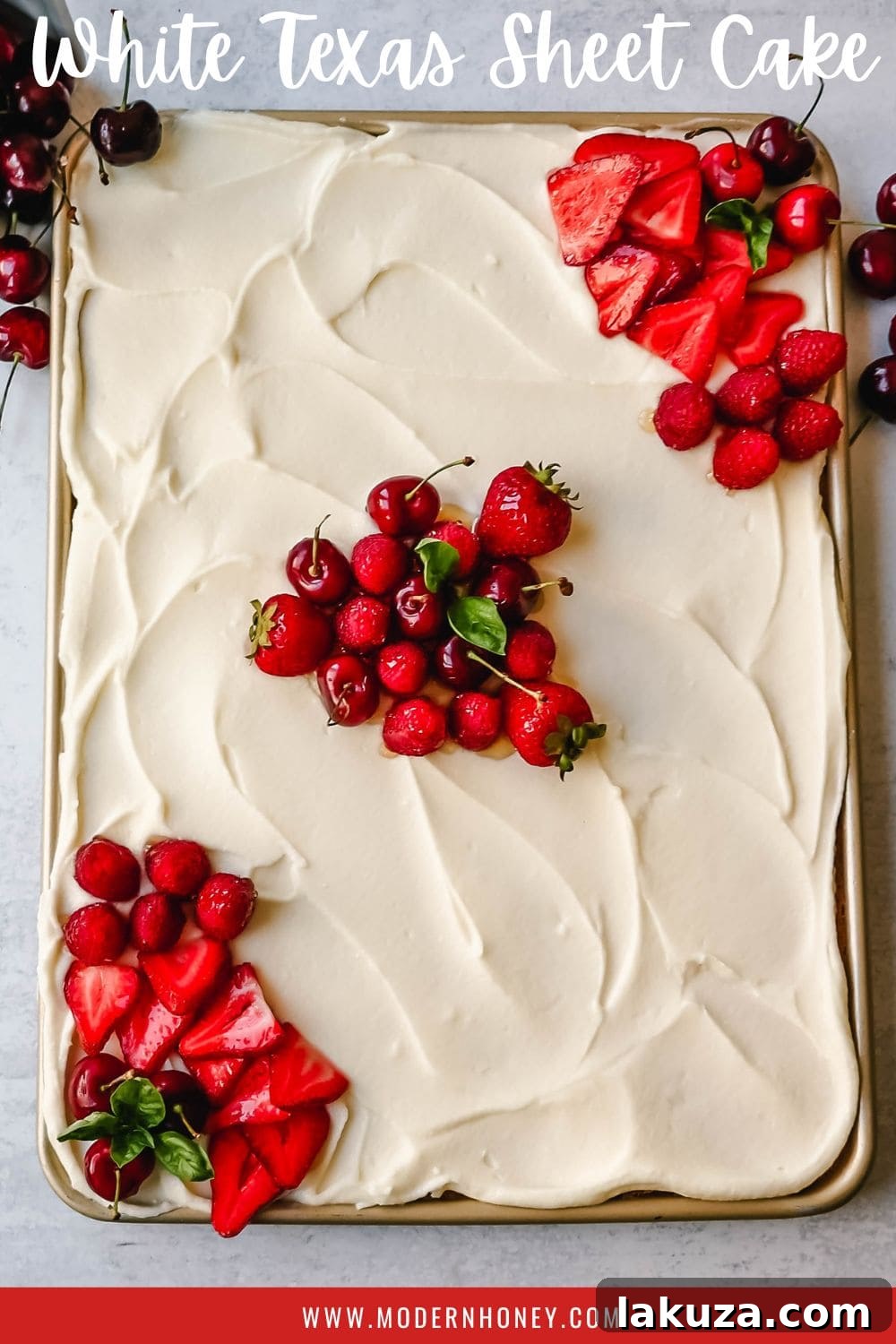 Southern Charm Vanilla Sheet Cake 10 A delectable slice of White Texas Sheet Cake on a plate, showing the moist cake, thick frosting, and fresh berries.
