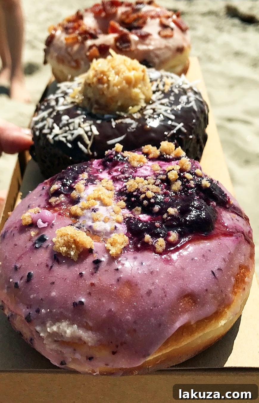 Orange County's Culinary Treasures 14 Sidecar Doughnuts on a beautiful California beach, showcasing their artisanal doughnuts against a scenic Orange County backdrop. A perfect spot for sweet treats.