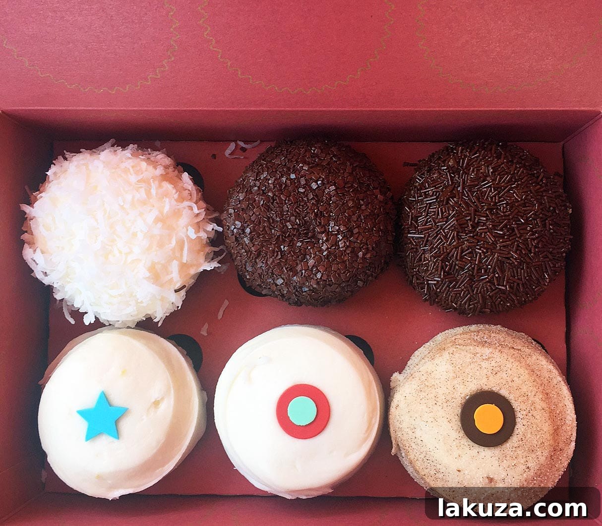 Orange County's Culinary Treasures 15 A vibrant display of Sprinkles Cupcakes in Corona del Mar, California, showcasing a variety of their famous gourmet cupcakes. A top dessert spot in Orange County.