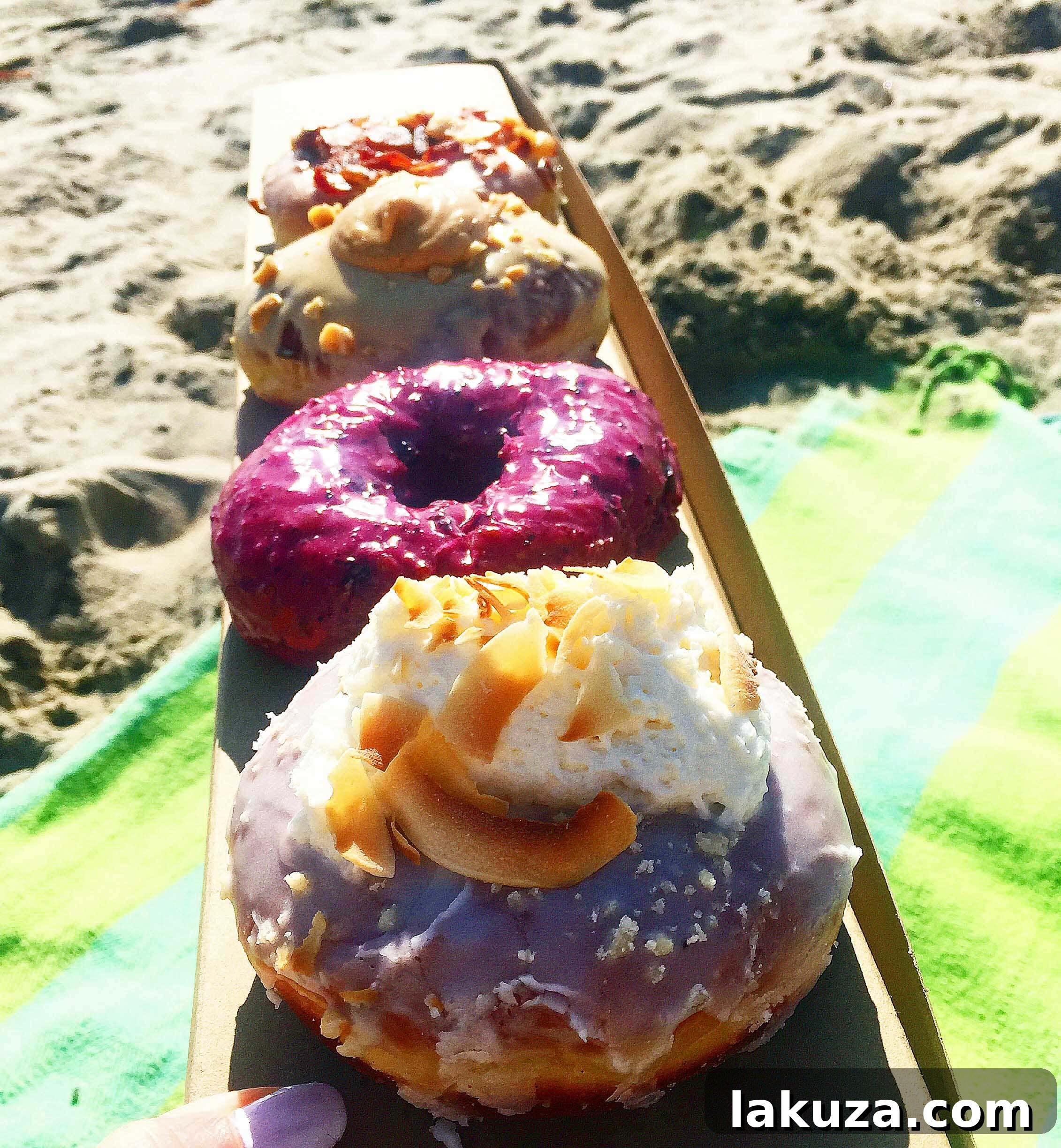 Orange County's Culinary Treasures 16 A close-up of delicious gourmet doughnuts from Sidecar Doughnuts, a highly-rated bakery in Orange County, California. Perfect for a sweet treat.