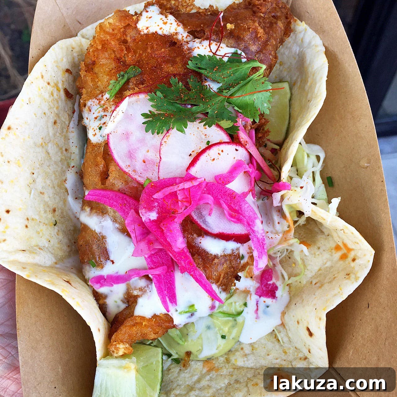 Orange County's Culinary Treasures 9 Delicious and fresh fish tacos from Slapfish, a highly-rated seafood restaurant in Orange County, California. Known for their sustainable and flavorful seafood dishes.