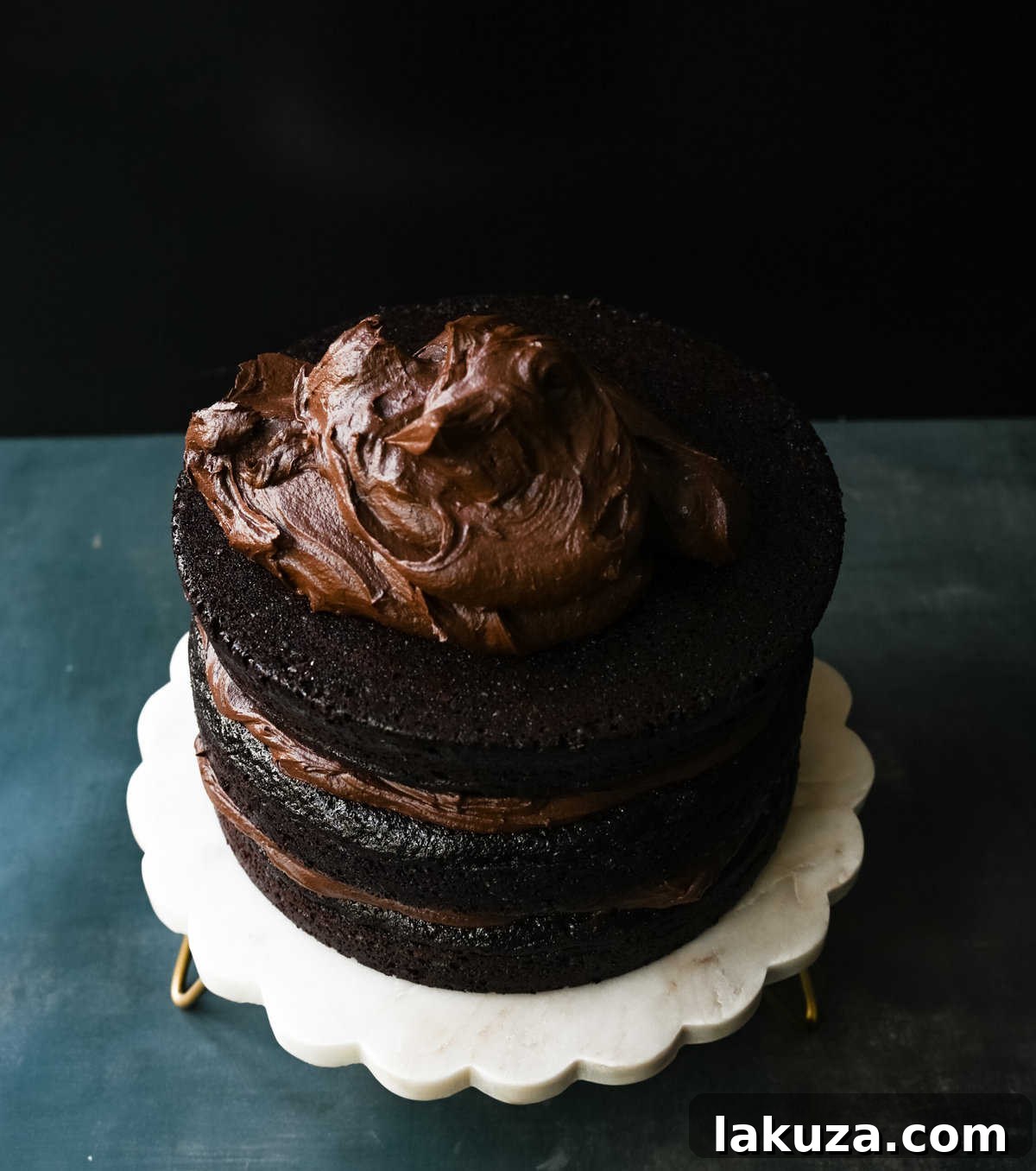 Head Over Heels Chocolate Cake 7 Love at First Sight Chocolate Cake. The BEST Chocolate Cake Recipe in the world. This moist, rich chocolate cake with chocolate frosting is one of the most popular cake recipes. This 5-Star Rated Chocolate Cake Recipe is the best homemade chocolate cake. Everyone will ask for this Chocolate Birthday Cake for every single birthday celebration!