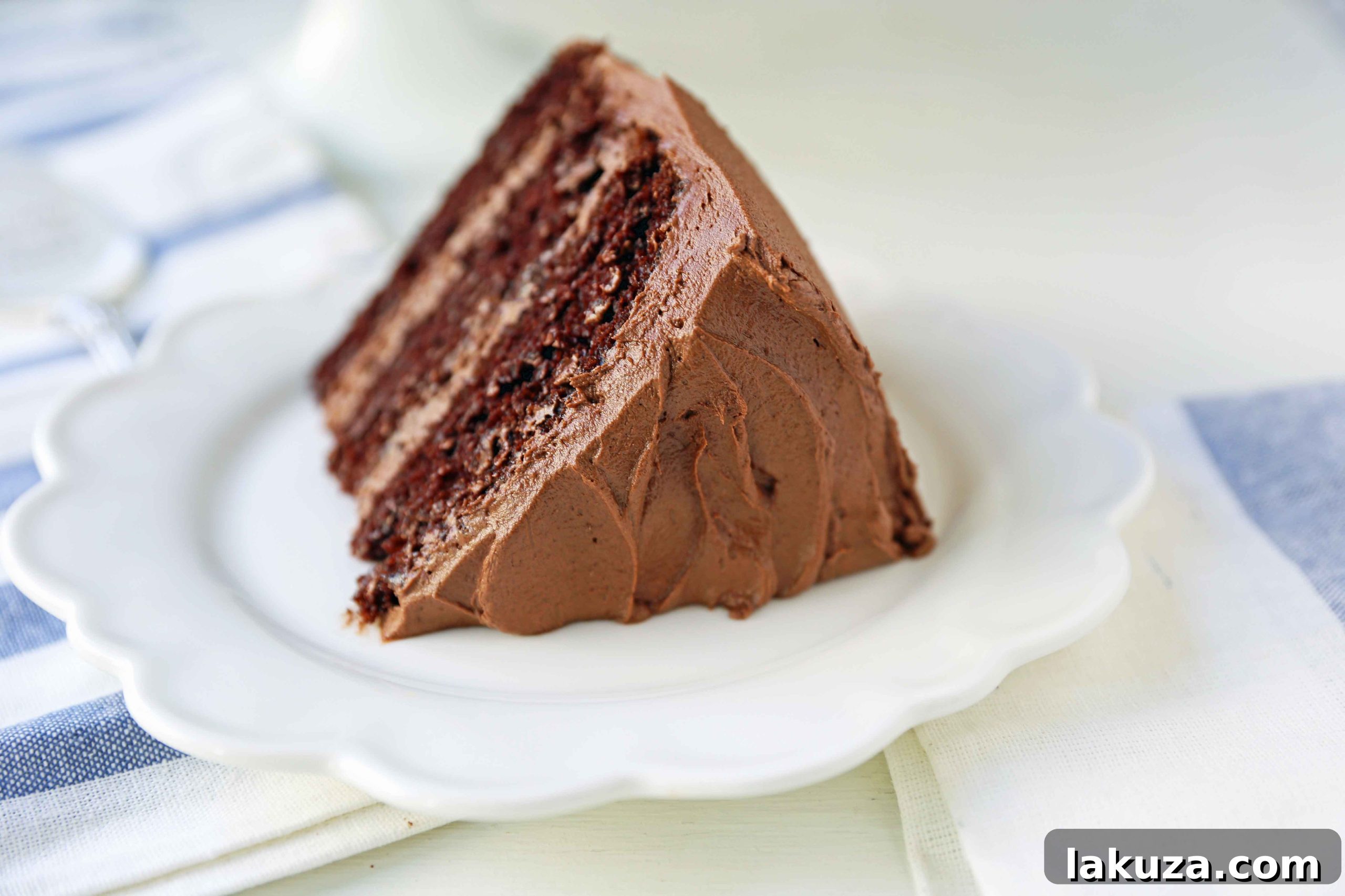 Head Over Heels Chocolate Cake 9 The Best Chocolate Cake Recipe Ever. How to make the perfect chocolate cake with chocolate frosting. 5-star rated chocolate cake recipe. Homemade chocolate cake that comes out perfect every single time. www.modernhoney.com #chocolatecake #cake