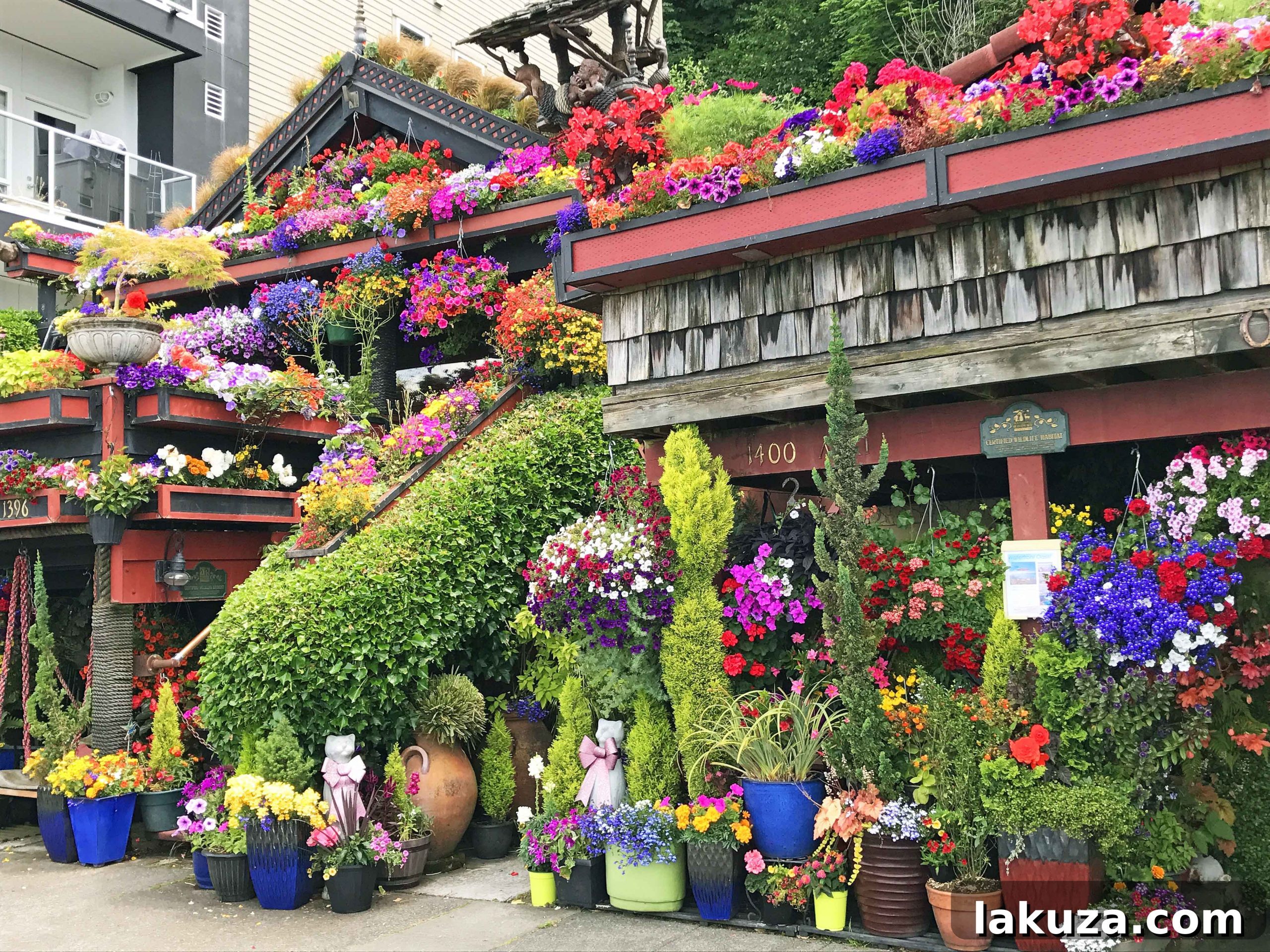 Famous flower-adorned home at Alki Beach, showcasing Seattle's lush greenery. A picturesque sight among the city's attractions.