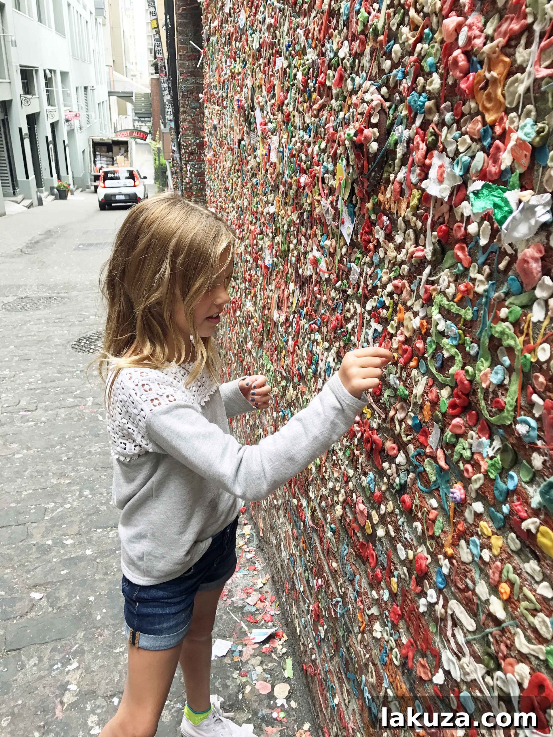 The iconic Gum Wall at Pike Place Market, a quirky and colorful Seattle landmark. Discover unique places to see in Seattle.