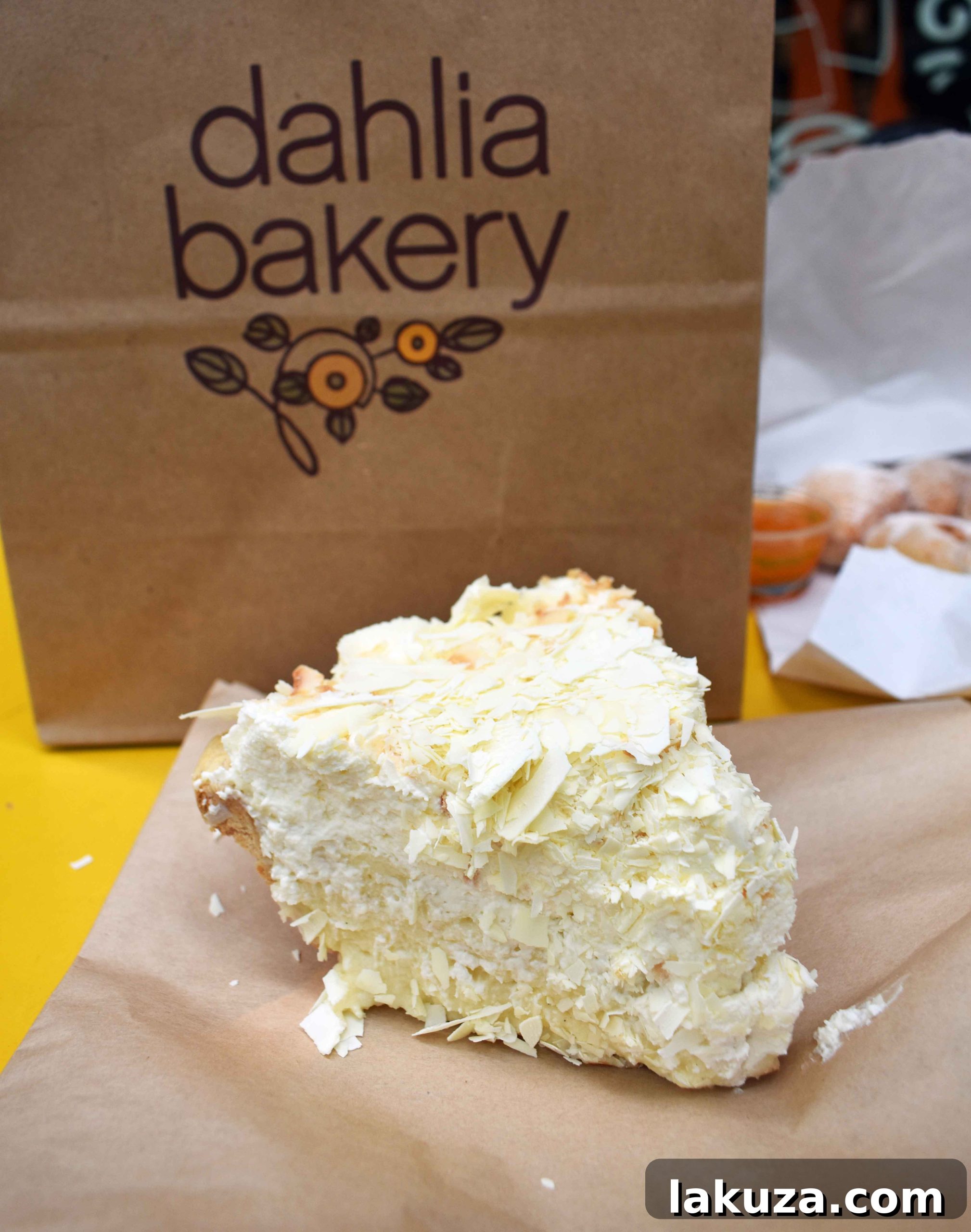 Decadent Coconut Cream Pie at Dahlia Bakery, a famous Seattle eatery. Part of the best places to eat in the city.