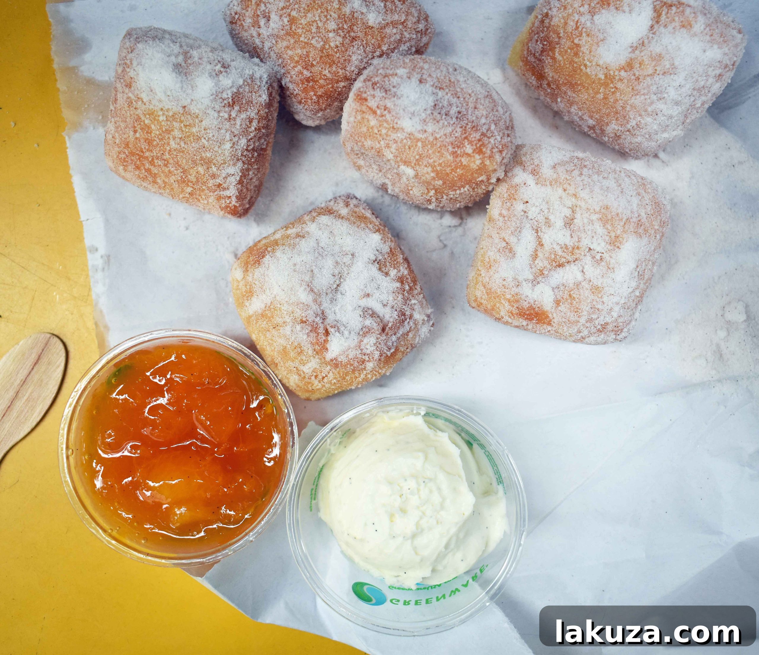 Delicious Beignets doughnuts with mascarpone vanilla bean dipping sauce at Dahlia Bakery, Seattle. A must-try sweet treat.