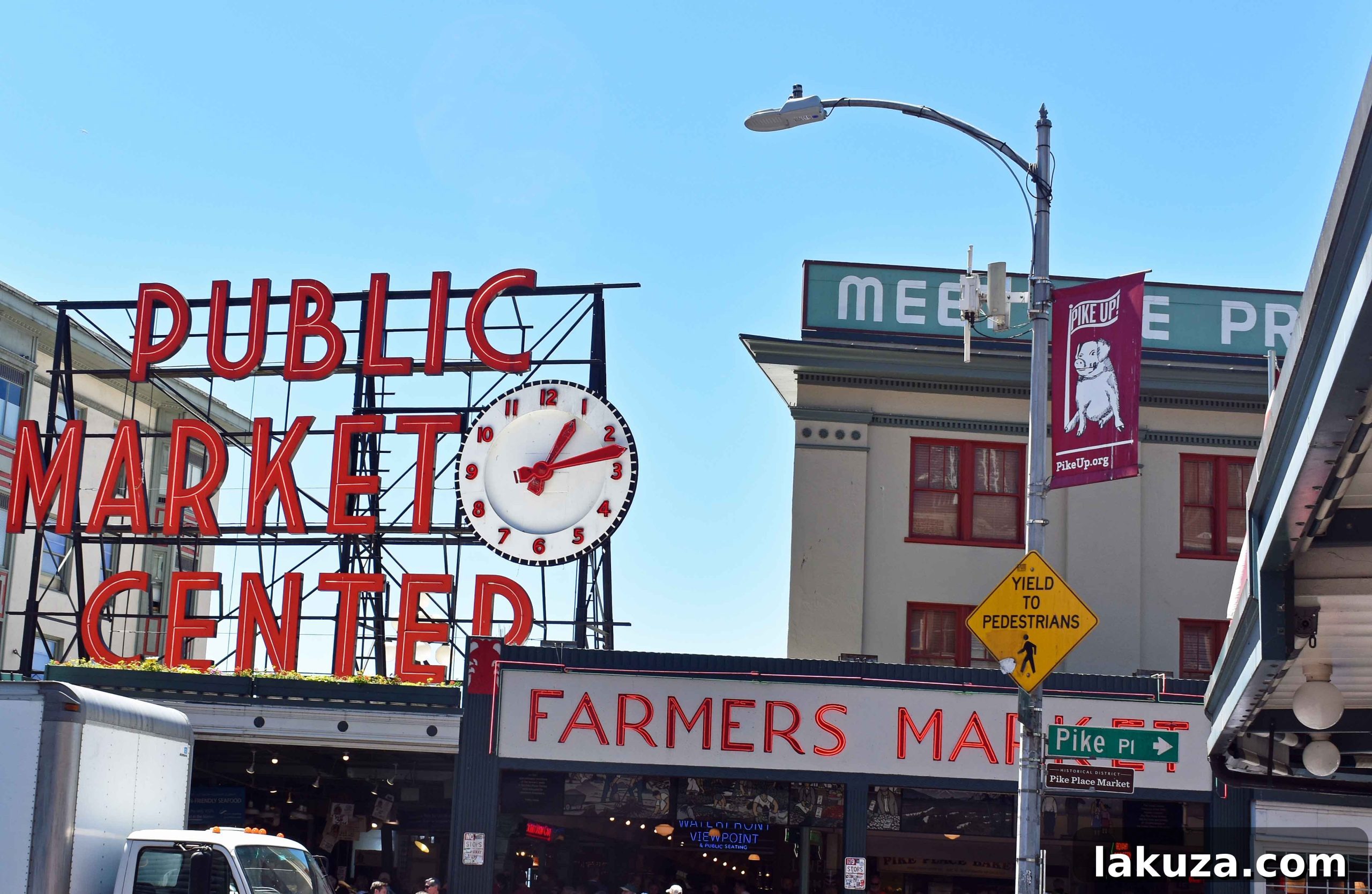 Iconic Pike Place Market in Seattle, a vibrant hub of food, flowers, and local culture. Discover top Seattle attractions and dining spots.
