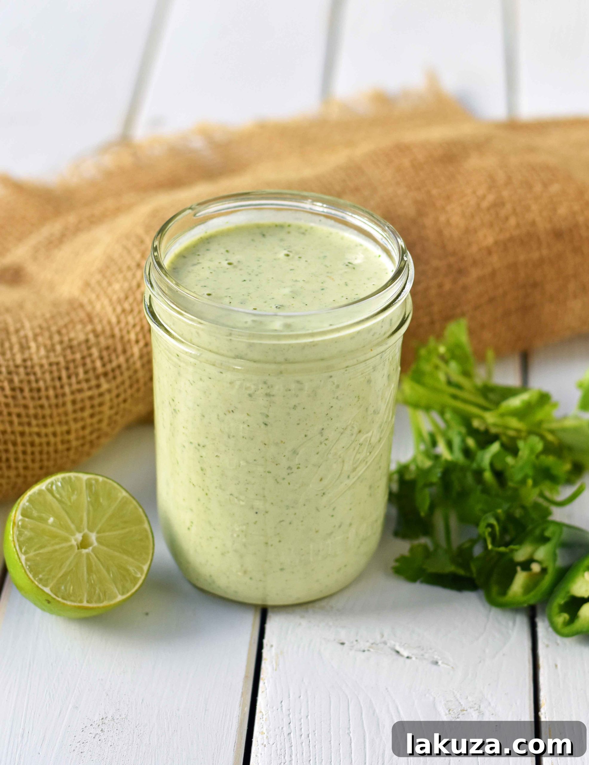 Chuy's Creamy Jalapeno Cilantro Dip Dressing. A copycat recipe for Chuy's famous jalapeno dip. This creamy jalapeno dip can be served with chips, drizzled on a burrito bowl, or as a dressing on a salad. Creamy Jalapeno Cilantro dressing makes everything taste good! Also a Cafe Rio cilantro ranch dressing copycat recipe. Delicious homemade Tex-Mex dip.
