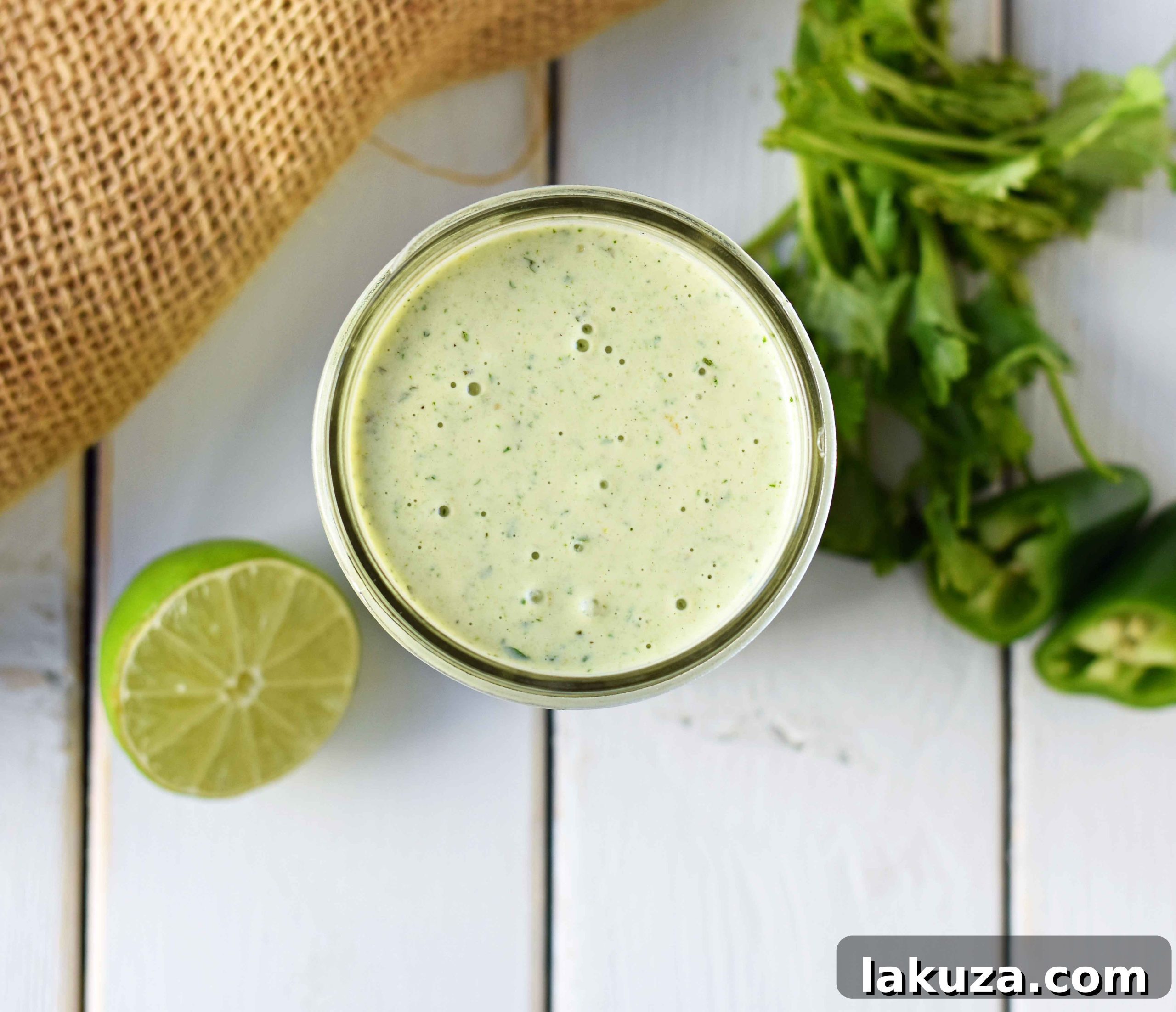 Chuy's Creamy Jalapeno Cilantro Dip Dressing. A copycat recipe for Chuy's famous jalapeno dip. This creamy jalapeno dip can be served with chips, drizzled on a burrito bowl, or as a dressing on a salad. Creamy Jalapeno Cilantro dressing makes everything taste good! Also a Cafe Rio cilantro ranch dressing copycat recipe. Versatile and delicious homemade dip.