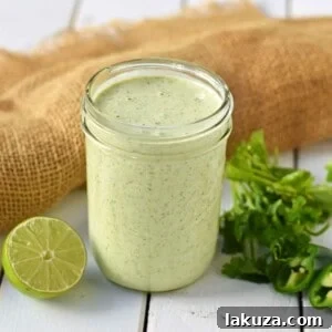 Chuy's Creamy Jalapeno Cilantro Dip Dressing. A copycat recipe for Chuy's famous jalapeno dip. This creamy jalapeno dip can be served with chips, drizzled on a burrito bowl, or as a dressing on a salad. Creamy Jalapeno Cilantro dressing makes everything taste good! Also a Cafe Rio cilantro ranch dressing copycat recipe. Delicious homemade Tex-Mex dip.
