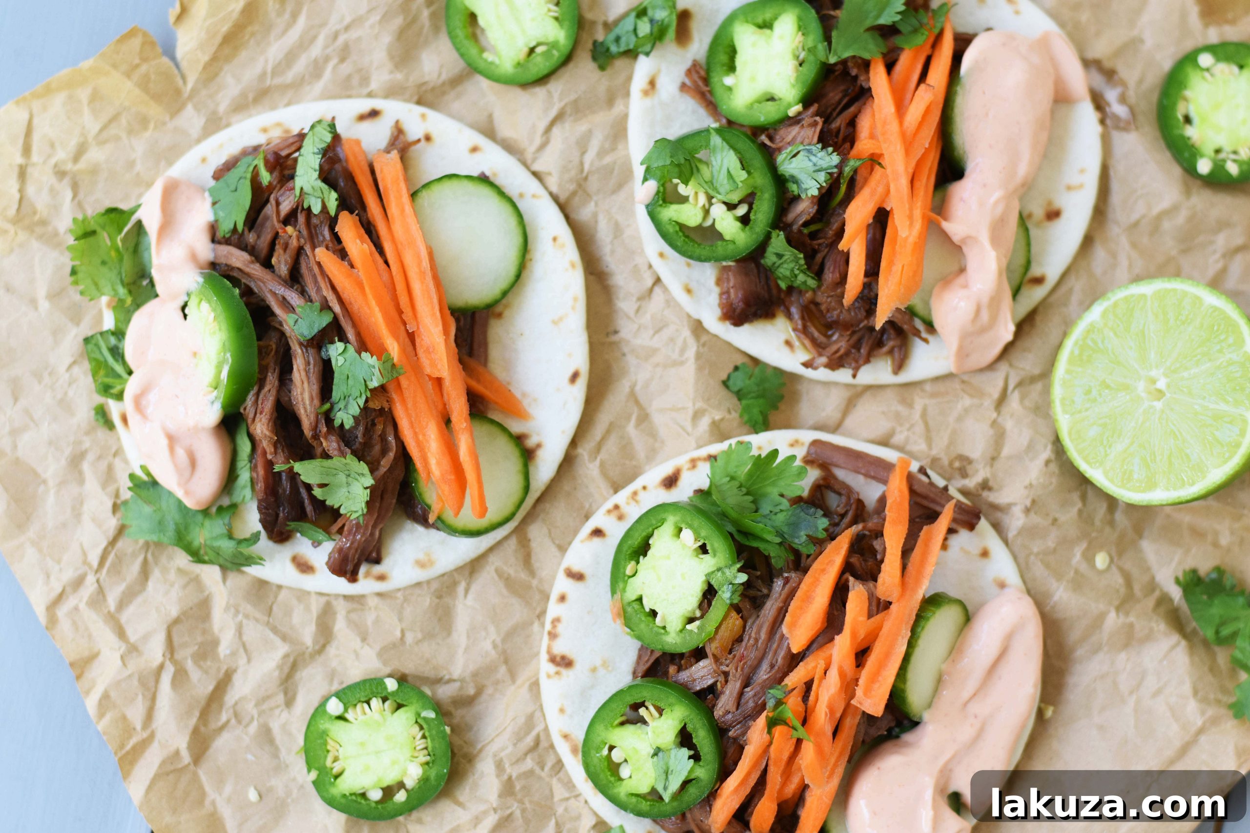 Assortment of Slow Cooker Korean Beef Tacos on a serving platter