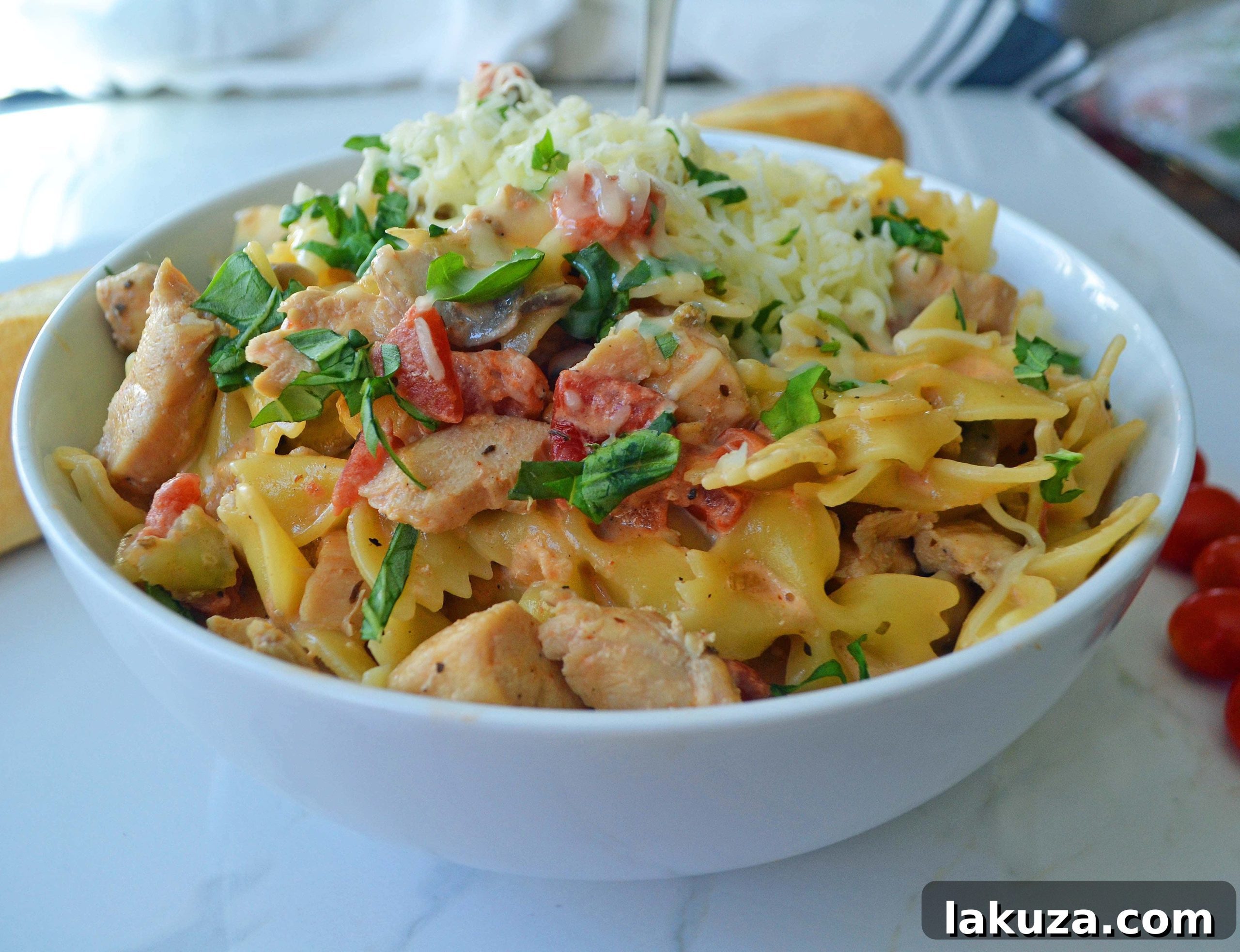 All Dressed Up Bowtie Chicken Pasta. Sauteed Chicken, Artichokes, Roasted Tomatoes, Heavy Cream, Fresh Basil, and Parmesan Cheese all tossed with Bowtie Pasta. A Modern Honey Recipe.