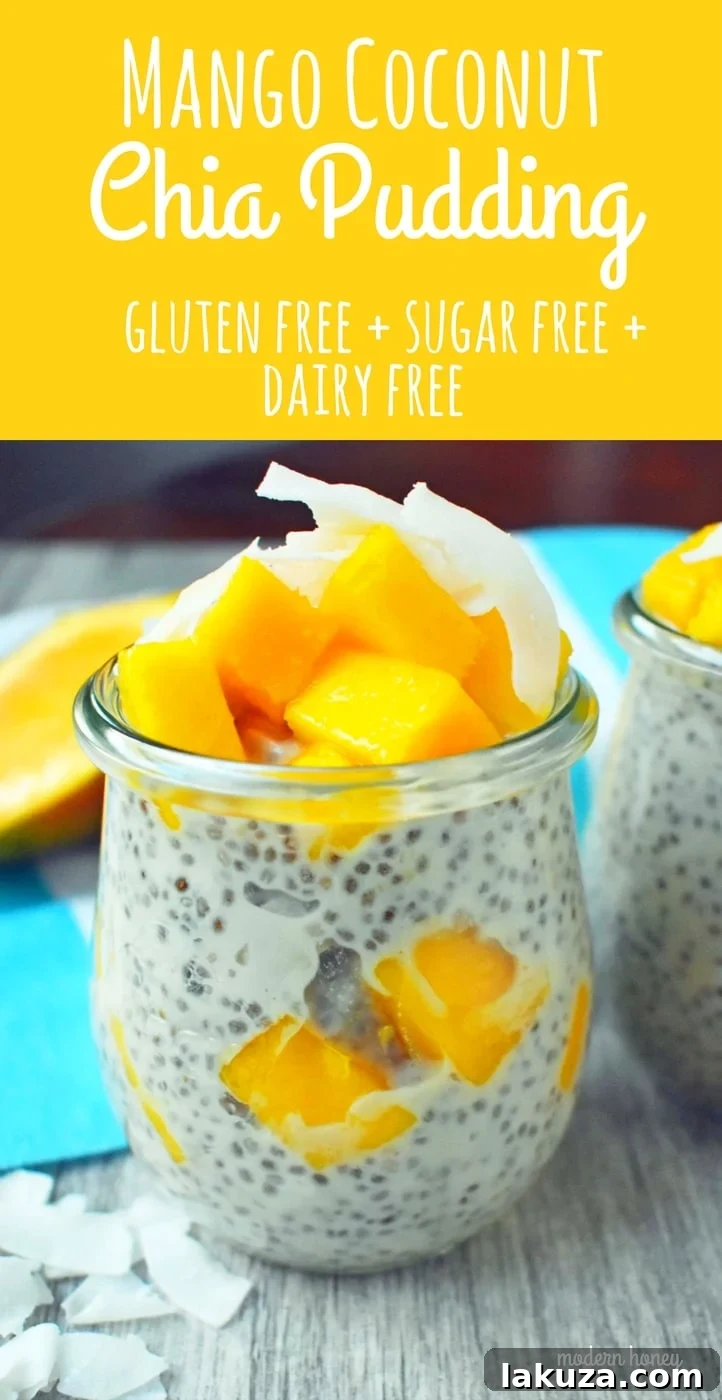 A tall glass jar filled with layers of Mango Coconut Chia Pudding and fresh mango, ready to be enjoyed as a healthy, energizing treat. A perfect example of a dairy-free, gluten-free, and sugar-free dessert.
