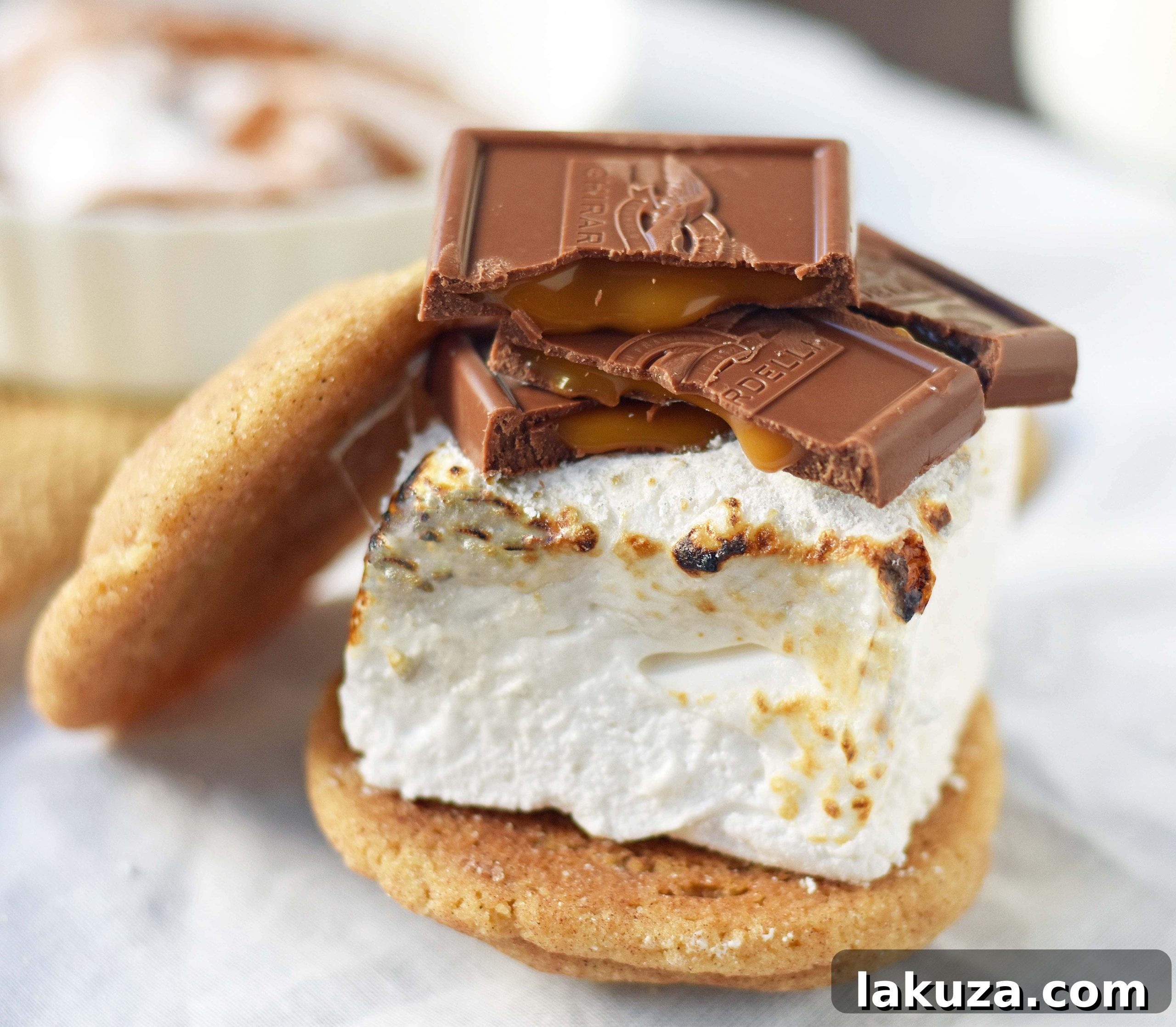 Chocolate Sea Salt Caramel S'mores. Brown Butter Cinnamon Sugar Snickerdoodles layered with homemade marshmallows, sea salt chocolate caramel ghirardelli squares. The ultimate gourmet s'mores experience.