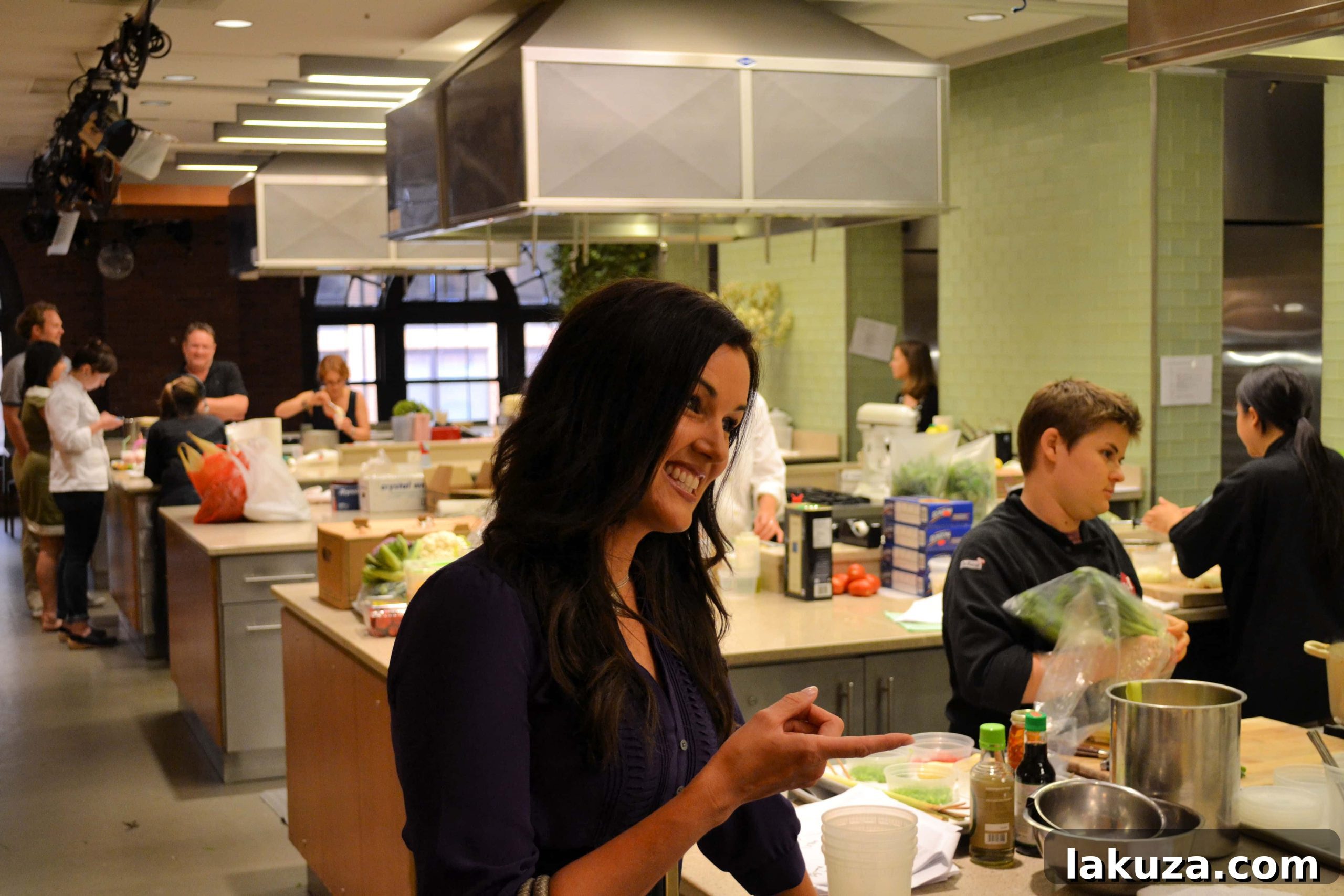 Inside Food Network Studios, capturing the vibrant atmosphere and Melissa Stadler's experience during filming.