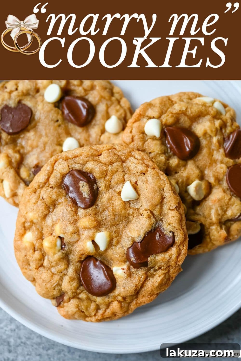 A mouth-watering image of the famous "I Want to Marry You Cookies" (also known as Marry Me Cookies), showcasing the rich brown butter, oatmeal, semi-sweet chocolate chips, and white chocolate that inspire marriage proposals.