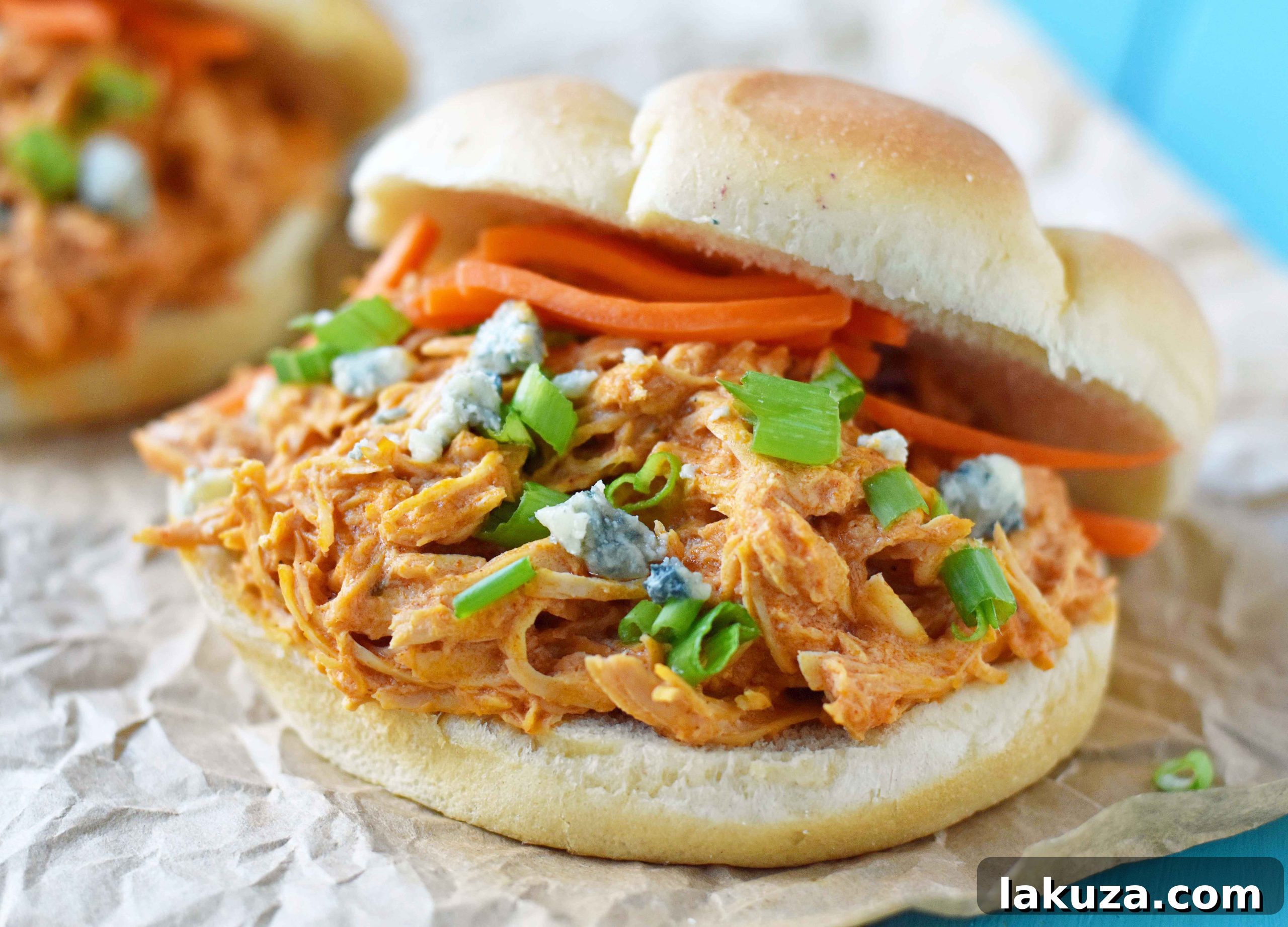 Zesty Creamy Slow Cooker Buffalo Ranch Chicken 2 Savory Buffalo Ranch Slow Cooker Chicken, perfect for game day tailgates and easy weeknight meals. Made with chicken breast, zesty buffalo wing sauce, creamy ranch dressing powder, and rich cream cheese for a flavorful, shreddable chicken. Ideal for sliders, wraps, or bowls.