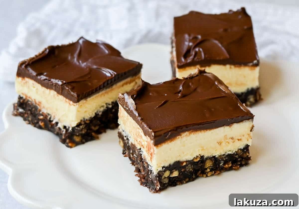 Rich and fudgy Nanaimo bars are the perfect no bake dessert. A chocolate, graham cracker, almond, and coconut base layer is topped with a creamy custard filling and chocolate ganache. You’ll be hooked on this classic Canadian treat!