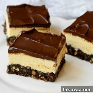 Rich and fudgy Nanaimo bars are the perfect no bake dessert. A chocolate, graham cracker, almond, and coconut base layer is topped with a creamy custard filling and chocolate ganache. You’ll be hooked on this classic Canadian treat!