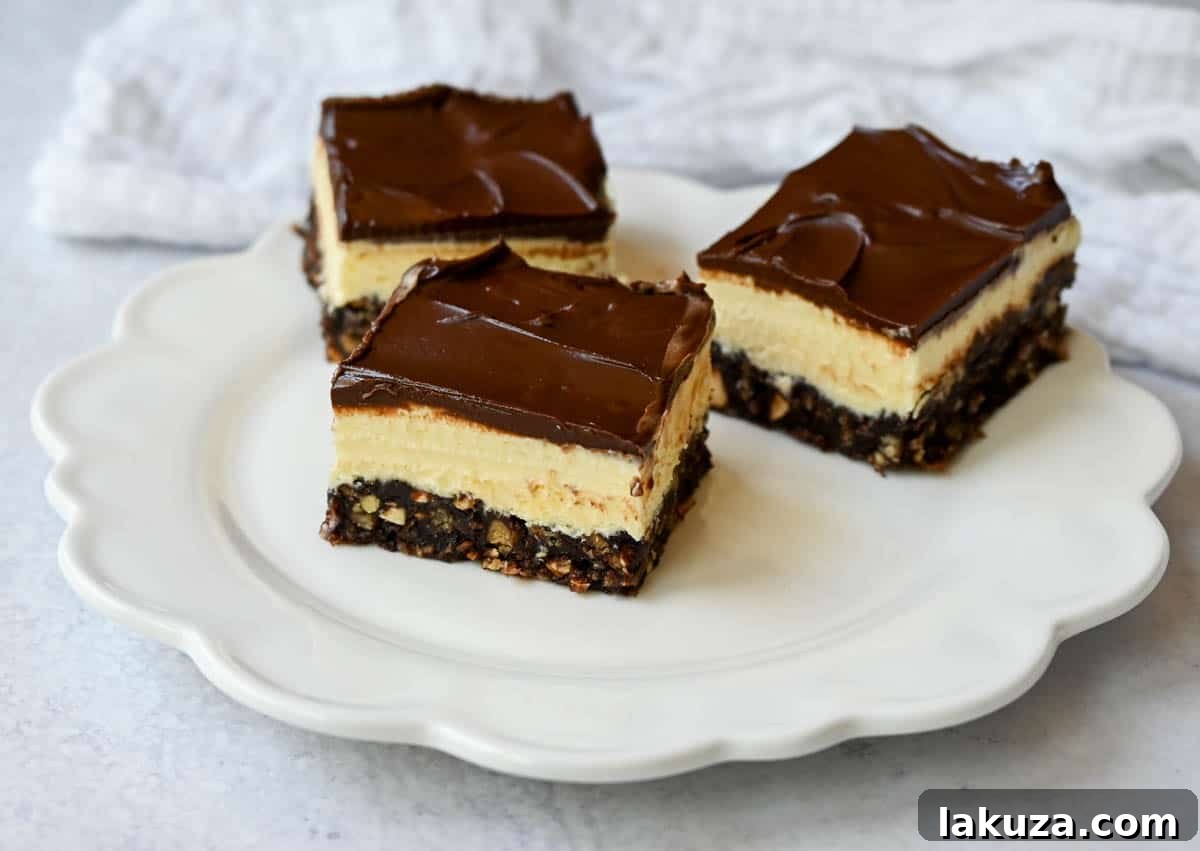 Rich and fudgy Nanaimo bars are the perfect no bake dessert. A chocolate, graham cracker, almond, and coconut base layer is topped with a creamy custard filling and chocolate ganache. You’ll be hooked on this classic Canadian treat!