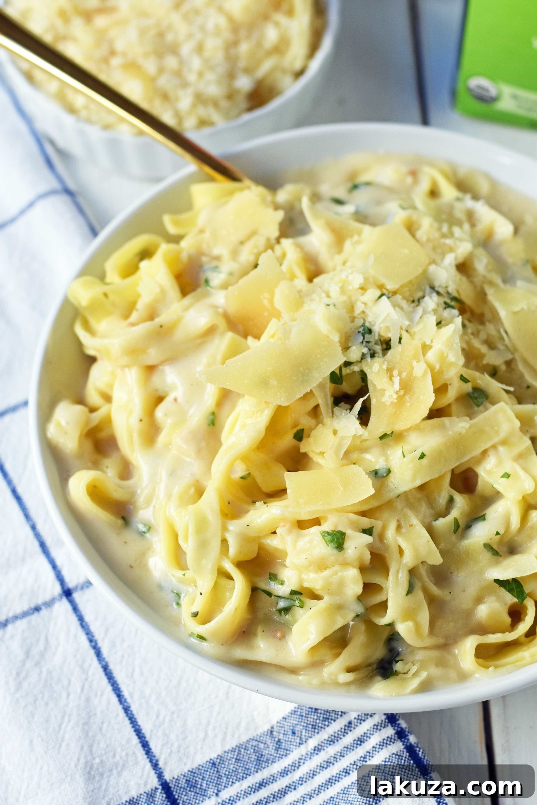 Guiltless Alfredo Indulgence 4 Skinny Fettuccine Alfredo is a low-fat version of America's favorite pasta dish. Rich and creamy fettuccine alfredo without all of the fat. This skinny fettuccine alfredo sauce is made with milk instead of heavy cream and has all of the flavor as the original. A 30-minute healthy meal that kids love. www.modernhoney.com