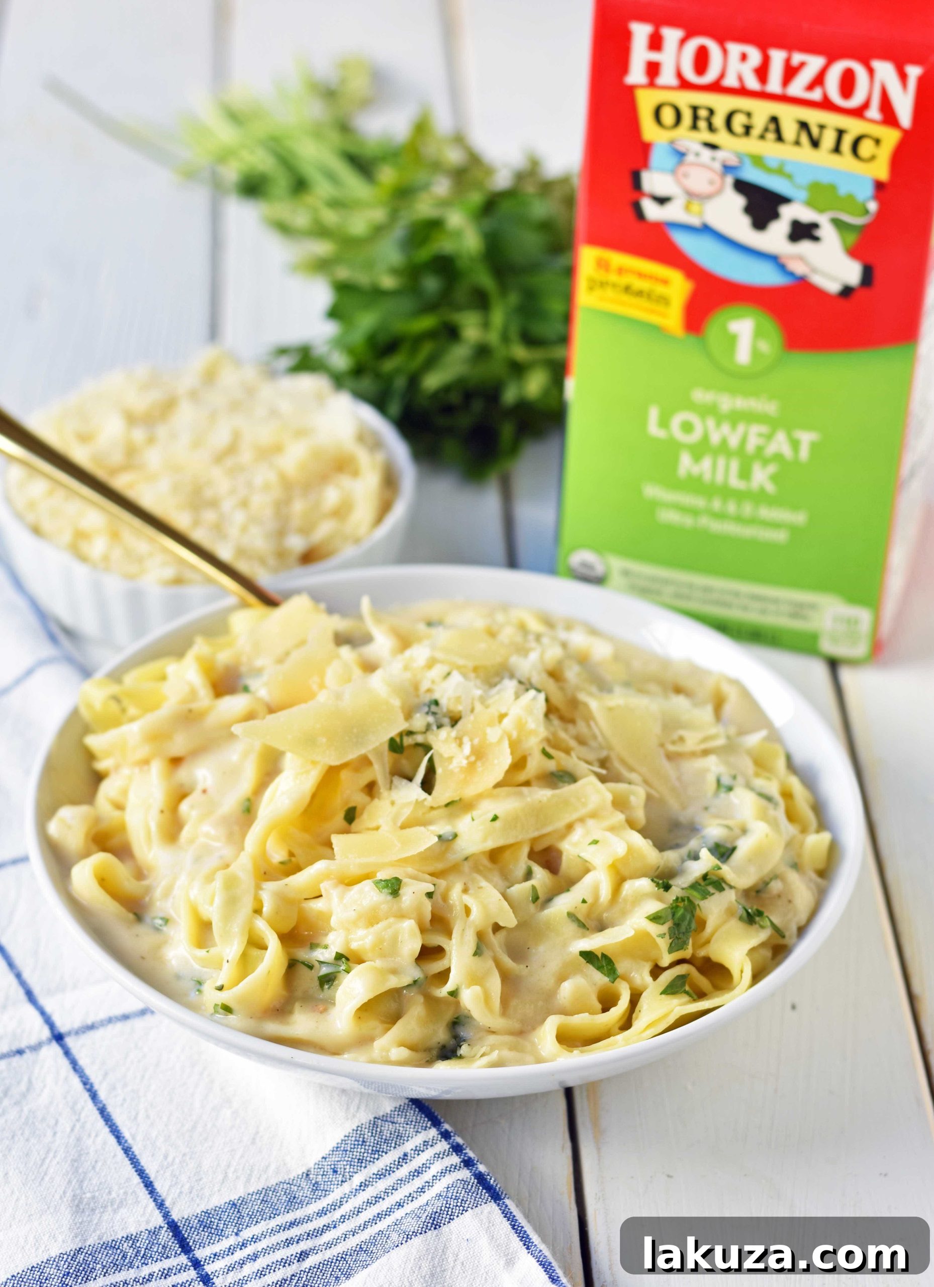 Guiltless Alfredo Indulgence 5 Skinny Fettuccine Alfredo is a low-fat version of America's favorite pasta dish. Rich and creamy fettuccine alfredo without all of the fat. This skinny fettuccine alfredo sauce is made with milk instead of heavy cream and has all of the flavor as the original. A 30-minute healthy meal that kids love. www.modernhoney.com