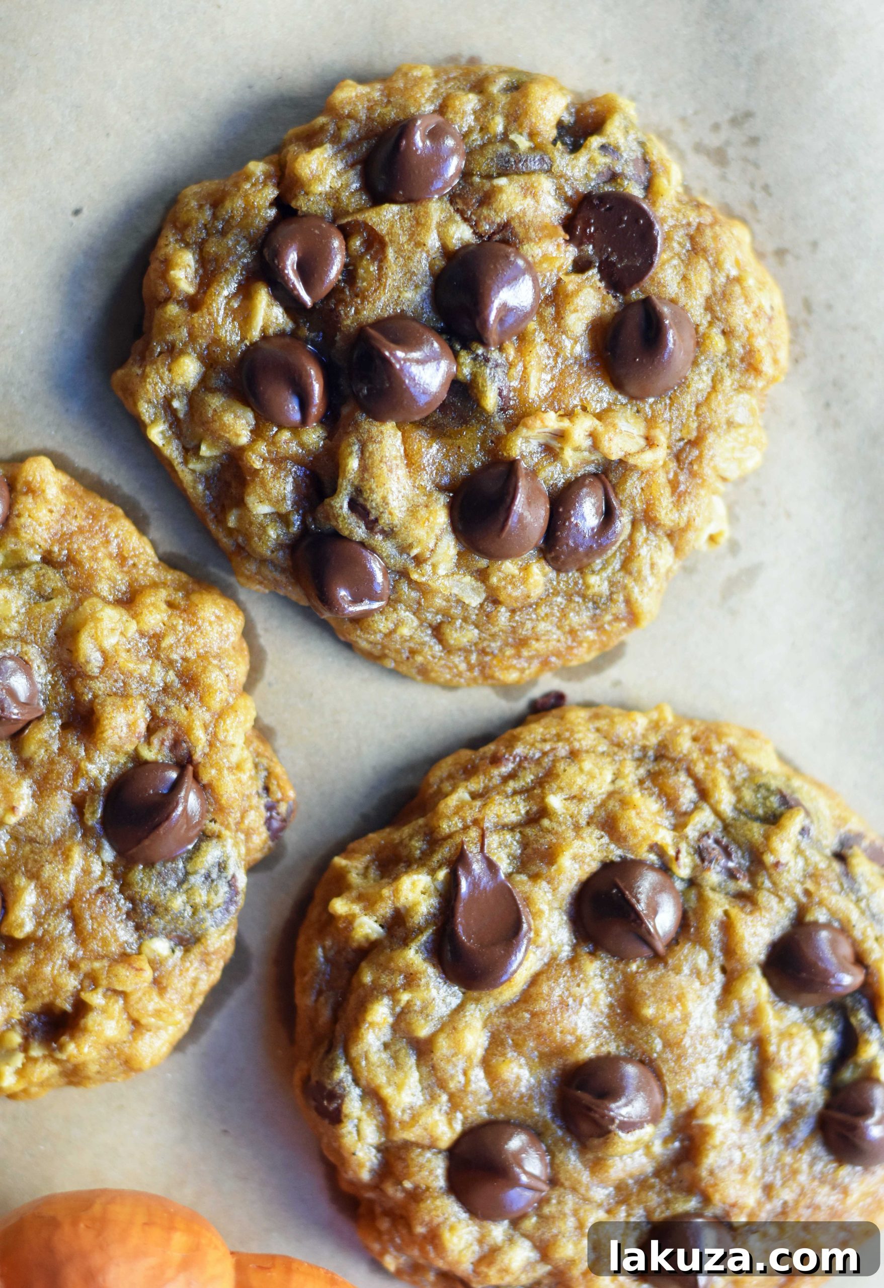 Close-up on a saucepan filled with melted butter and sugars, the first step in creating these delicious pumpkin cookies.