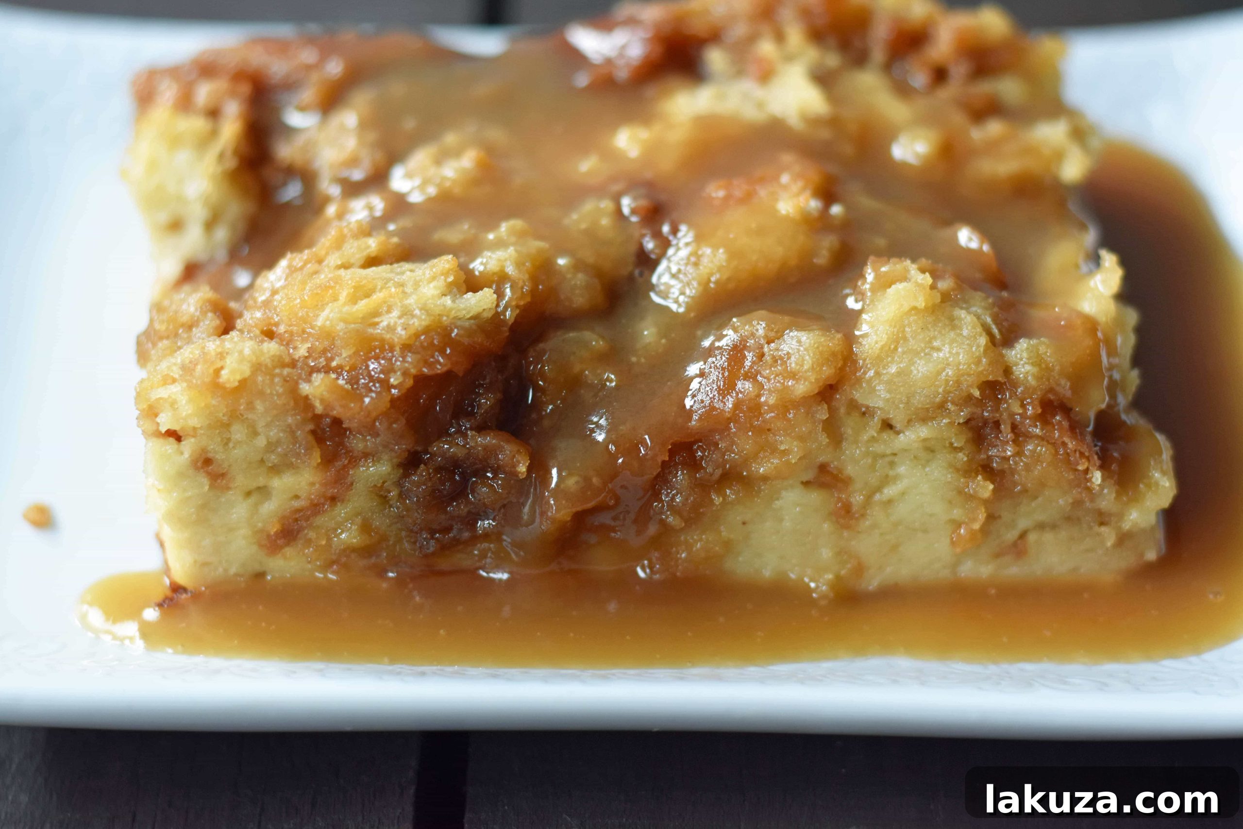 Salted Caramel Bread Pudding Delight 4 A baking dish filled with golden brown Salted Caramel Bread Pudding, ready to be served.