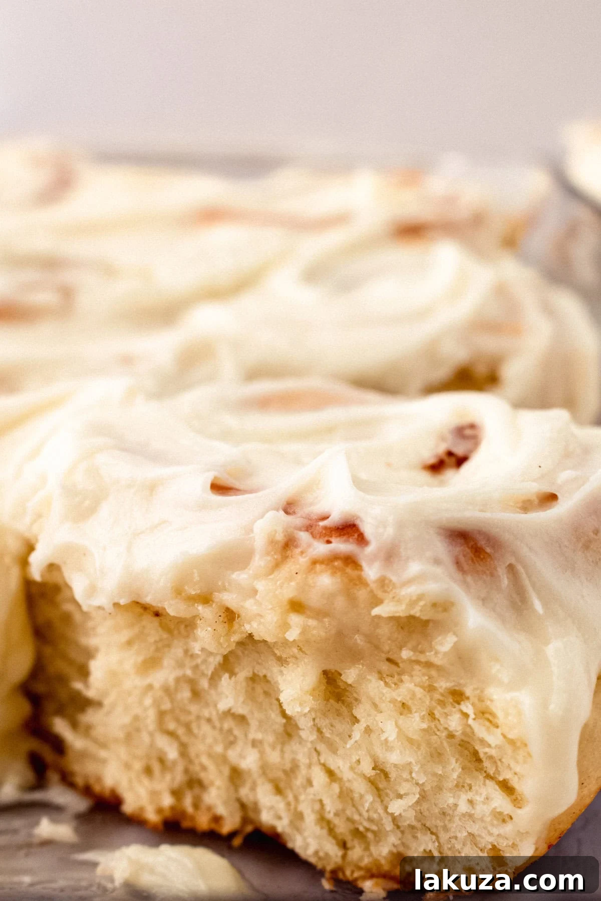 Heavenly Homemade Cinnamon Buns 6 Ingredients for Hayley's Famous Cinnamon Rolls, showcasing the distinct components for the dough, brown sugar filling, and cream cheese frosting, emphasizing fresh, quality items.