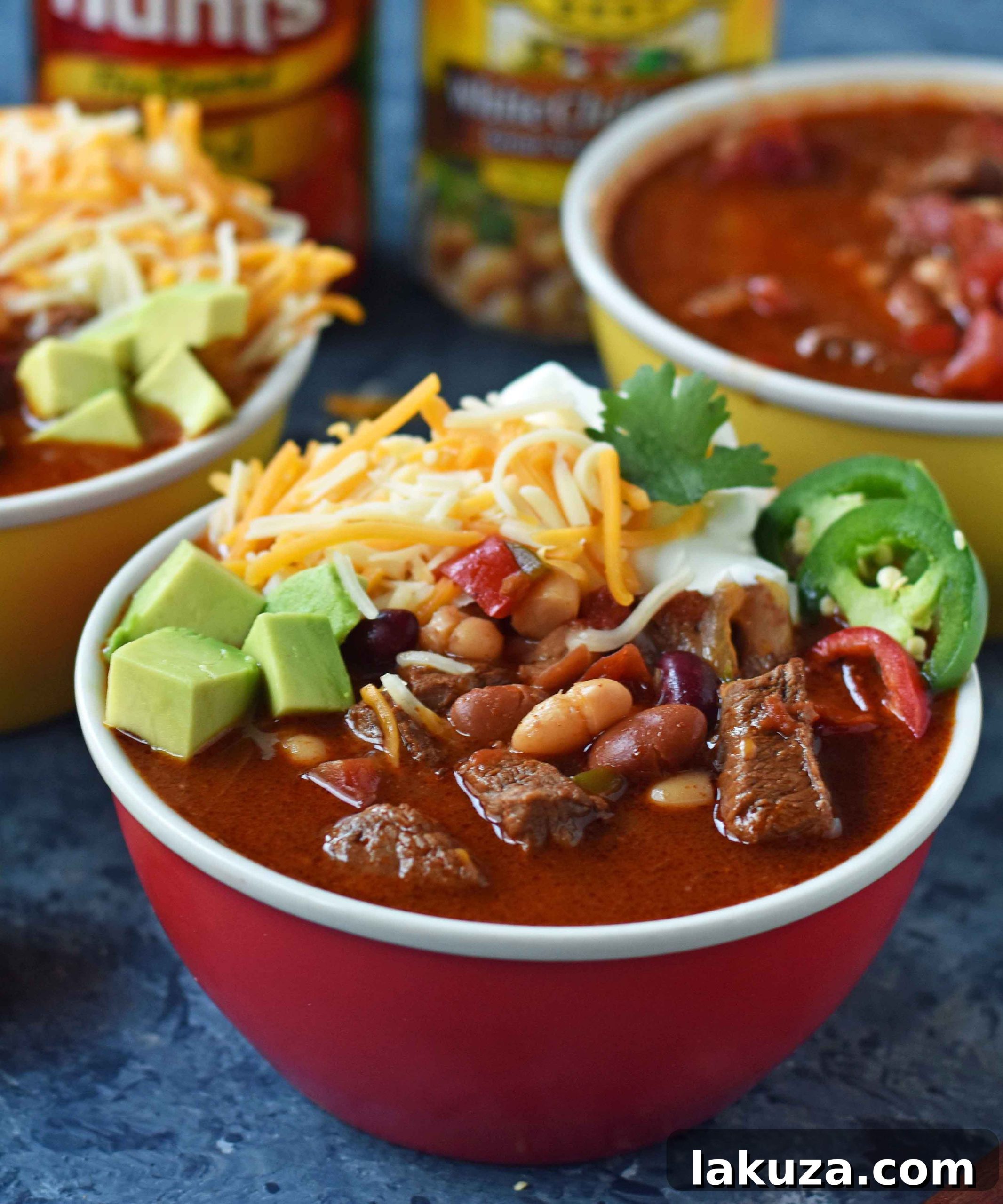 MJ's Award-Winning Chili simmering in a slow cooker, showcasing its rich texture.