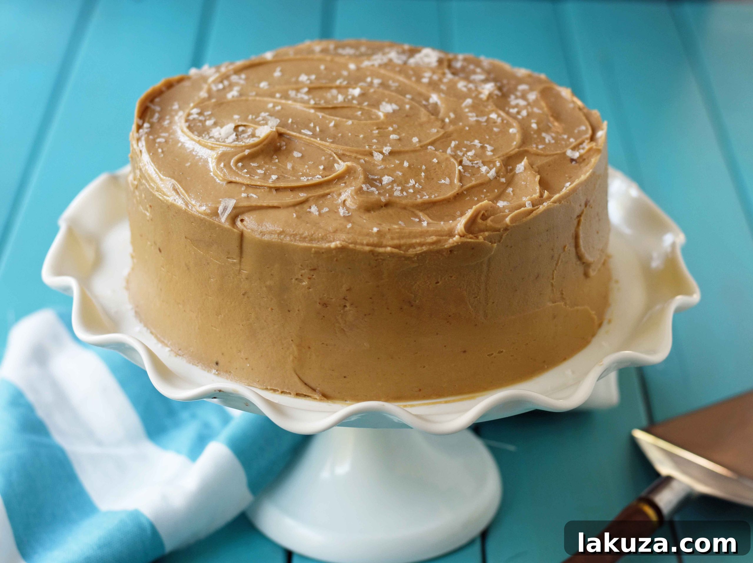 Southern Caramel Cake with Salted Caramel Frosting. A moist and fluffy yellow cake with sea salt caramel frosting. A Southern favorite cake! www.modernhoney.com