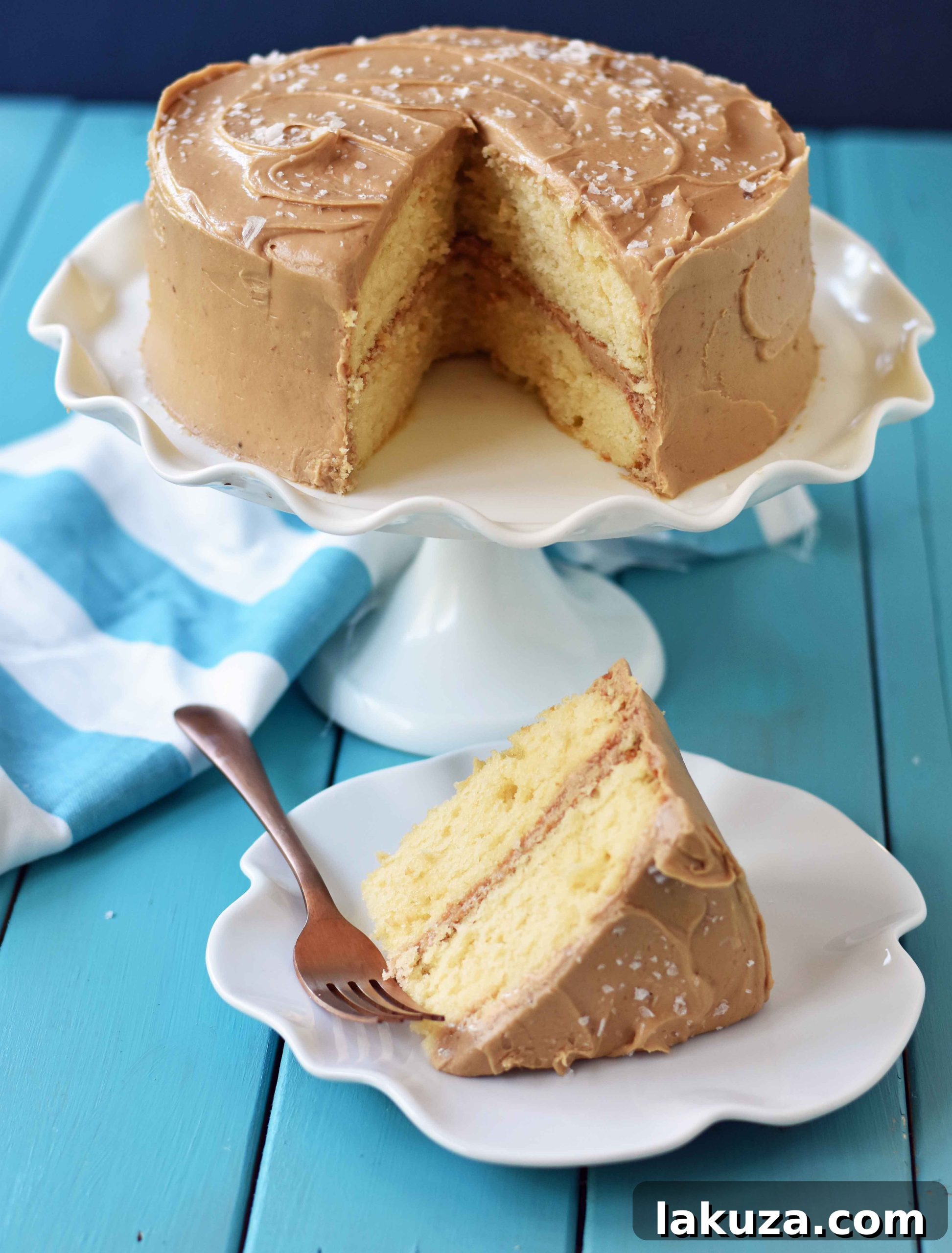 Southern Caramel Cake with Salted Caramel Frosting. A moist and fluffy yellow cake with sea salt caramel frosting. A Southern favorite cake! www.modernhoney.com