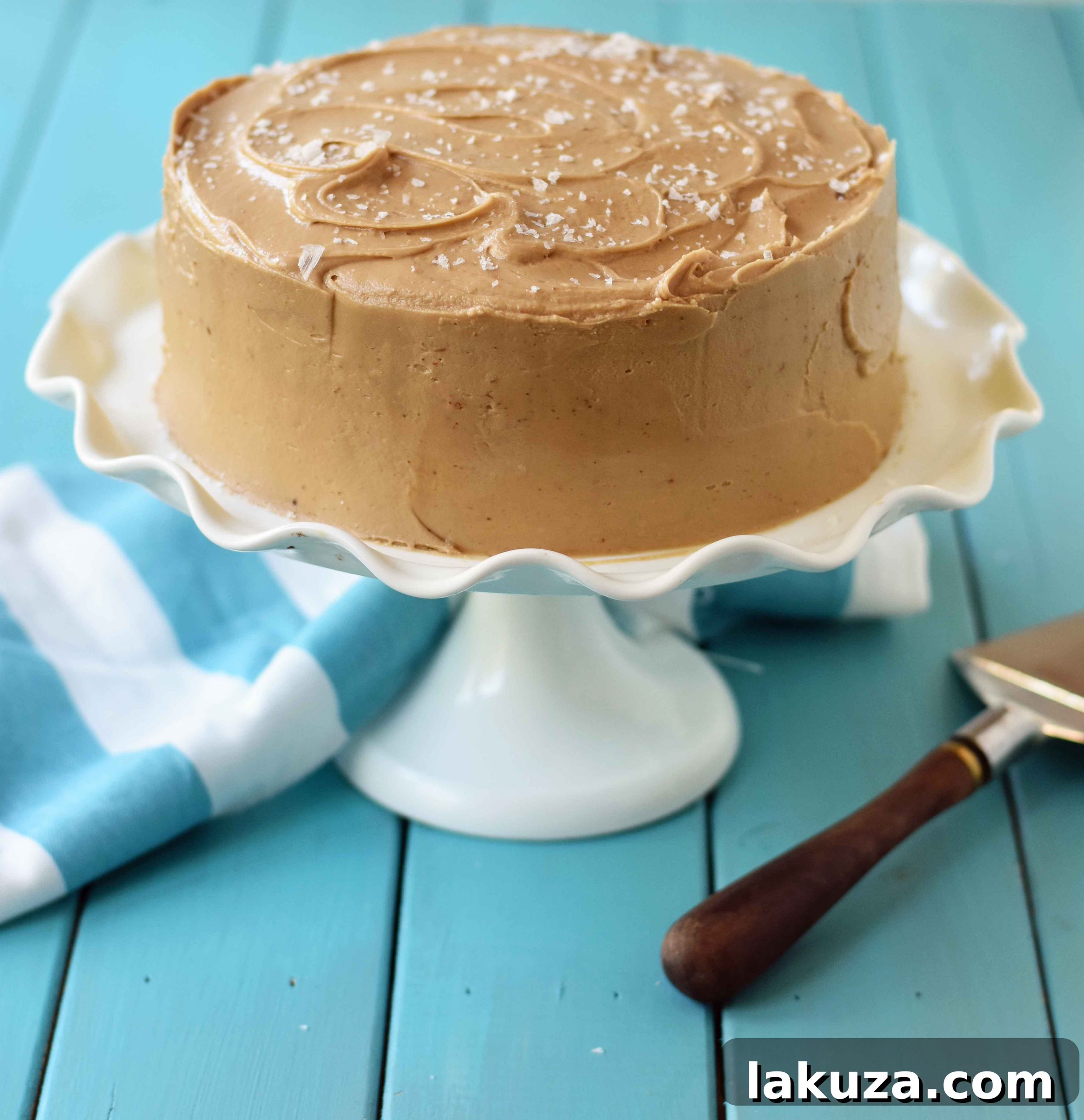 Southern Caramel Cake with Salted Caramel Frosting. A moist and fluffy yellow cake with sea salt caramel frosting. A Southern favorite cake! www.modernhoney.com
