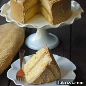 Southern Caramel Cake with Salted Caramel Frosting. A moist and fluffy yellow cake with sea salt caramel frosting. A Southern favorite cake! www.modernhoney.com