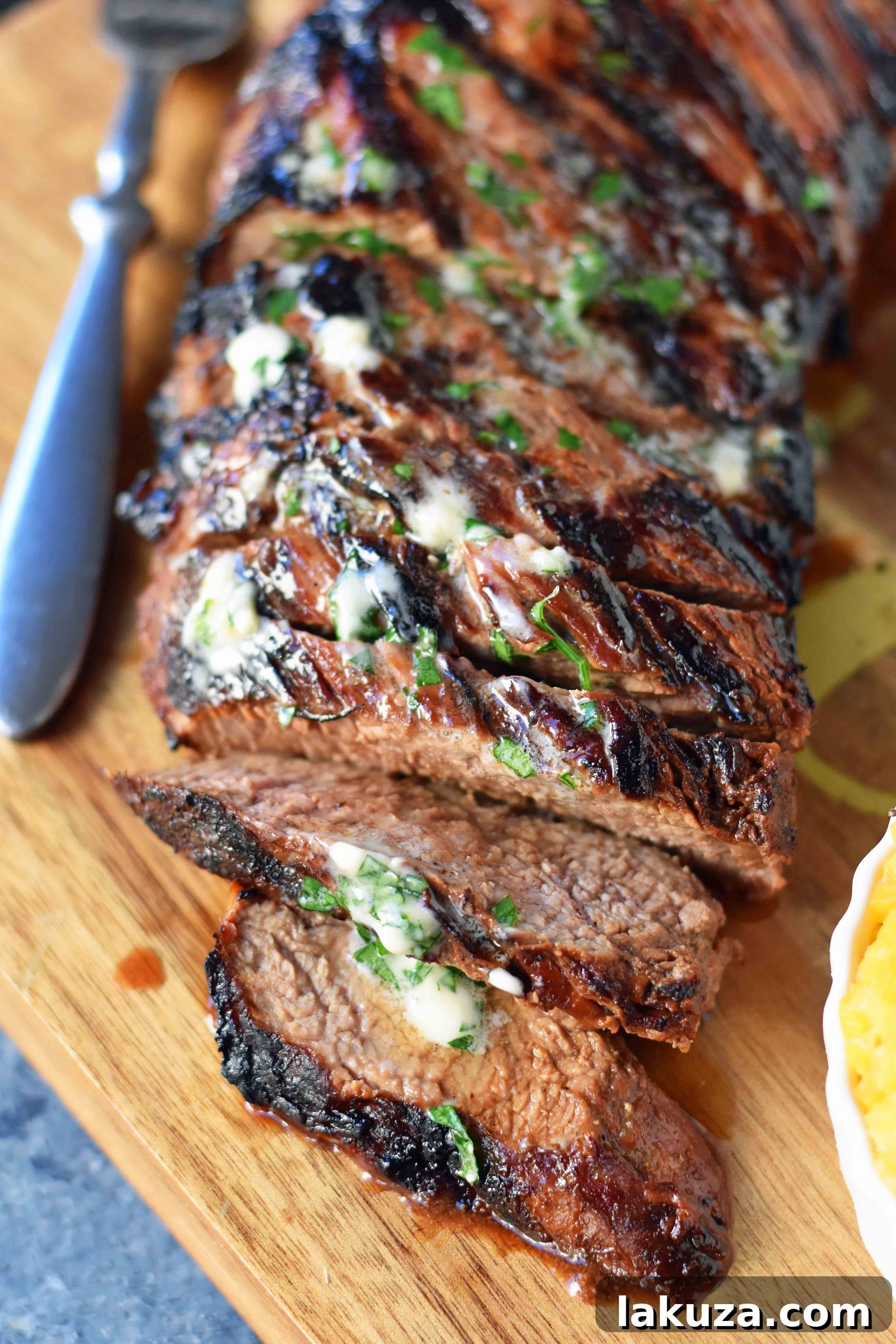 Grilled Tri-Tip Steak Marinade. How to make a juicy and flavorful tri-tip steak on the grill paired with Alexia premium side dishes. www.modernhoney.com
