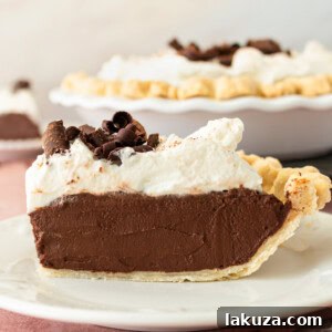 This is the best Chocolate Cream Pie recipe made with decadent chocolate custard in a flaky, buttery crust and topped with homemade whipped cream and chocolate shavings. You will love this chocolate pie recipe!