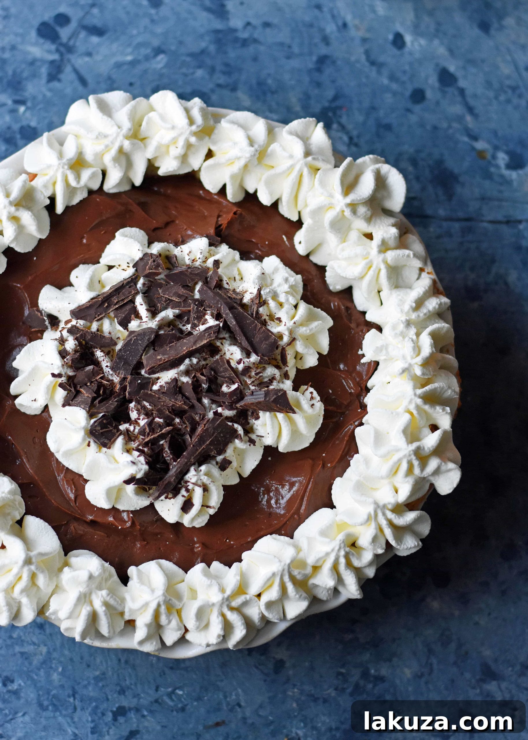 Full Chocolate Cream Pie, beautifully garnished and ready for slicing.