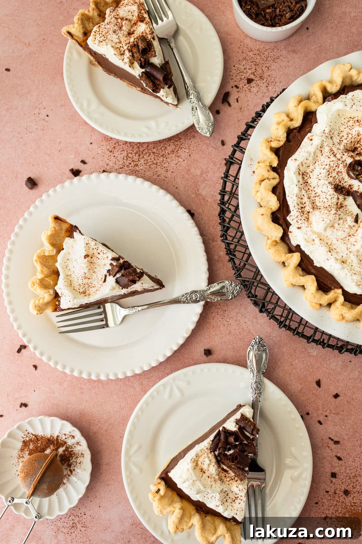 Multiple slices of Chocolate Cream Pie arranged on a plate, ready to be served.