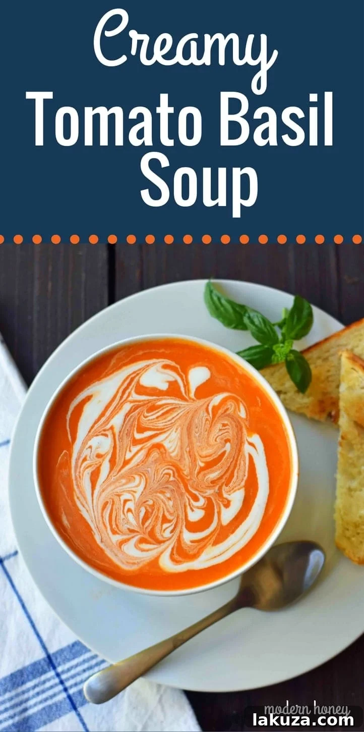 A close-up of the smooth, creamy texture of homemade tomato basil soup, garnished with a sprig of fresh basil. This SEO-friendly recipe emphasizes natural ingredients and simple steps for a delicious, comforting meal.