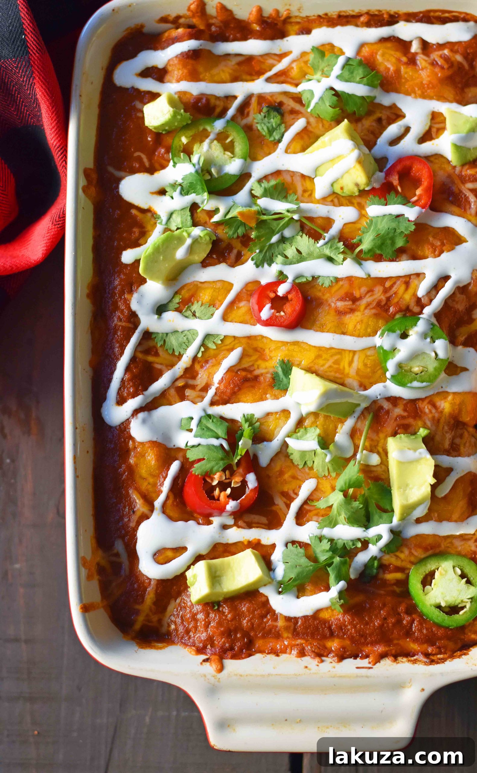 Red Chile Chicken Enchiladas with homemade red enchilada sauce. Learn how to make enchilada sauce from scratch for the best red chicken and cheese enchiladas.