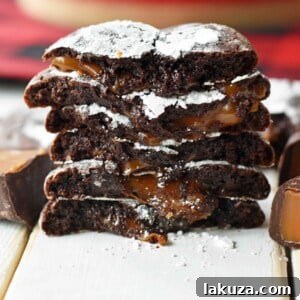Molten Caramel Chocolate Crinkles 8 Caramel Filled Chocolate Crinkle Cookies. Soft chewy chocolate cookies with soft caramel center and roll into powdered sugar. A popular chocolate caramel filled cookie. www.modernhoney.com