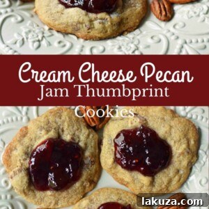 Cream Cheese Pecan Jam Thumbprint Cookies are a chewy pecan cookie baked until golden and topped with fresh berry jam.