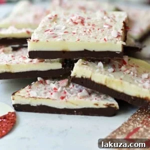 Chocolate Peppermint Bark with distinct layers and crushed candy canes.